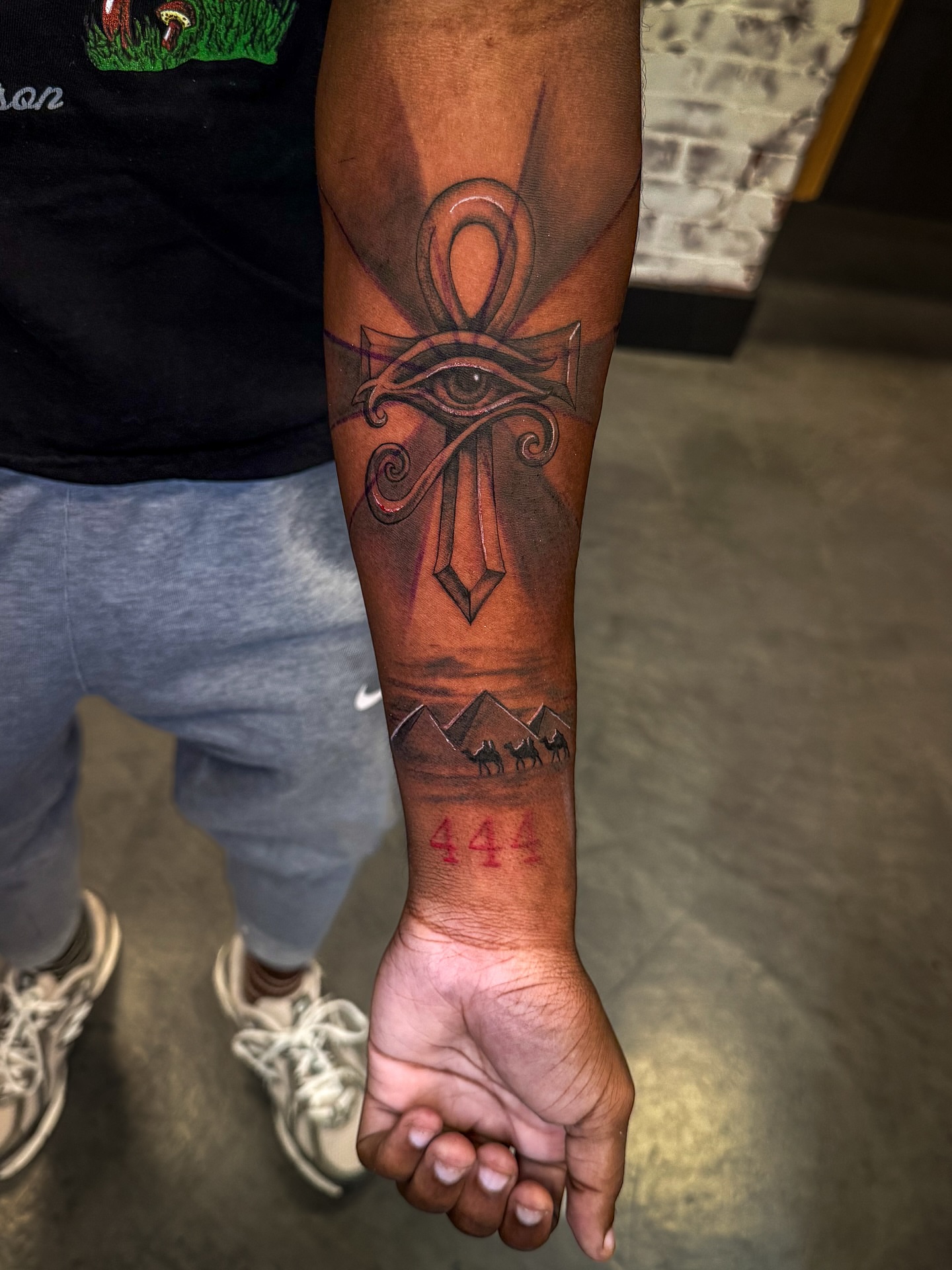Eye of horus black and grey tattoo on the forearm by Brandt Norcross