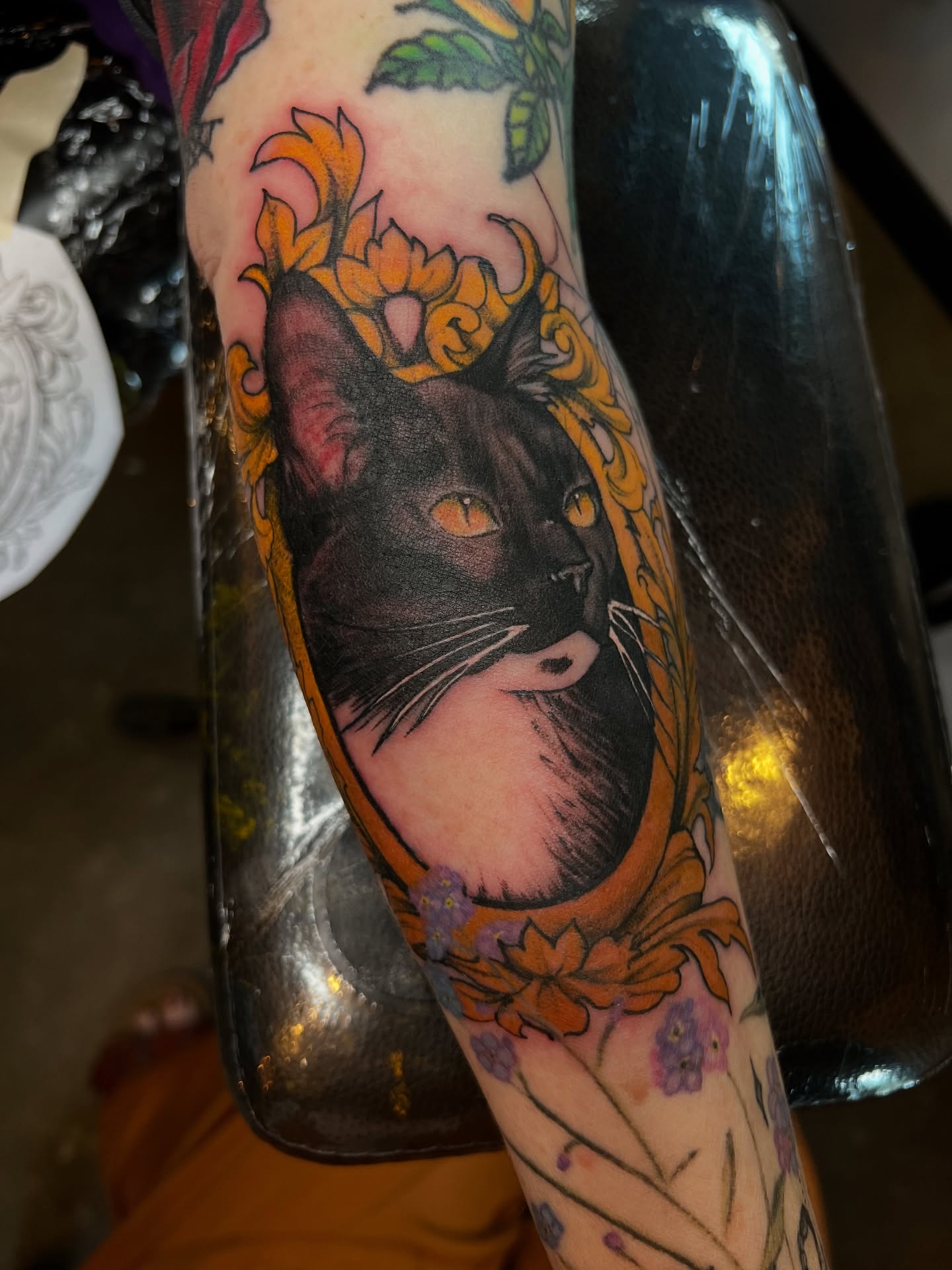 Cat realism tattoo on the forearm by Amanda Leitch