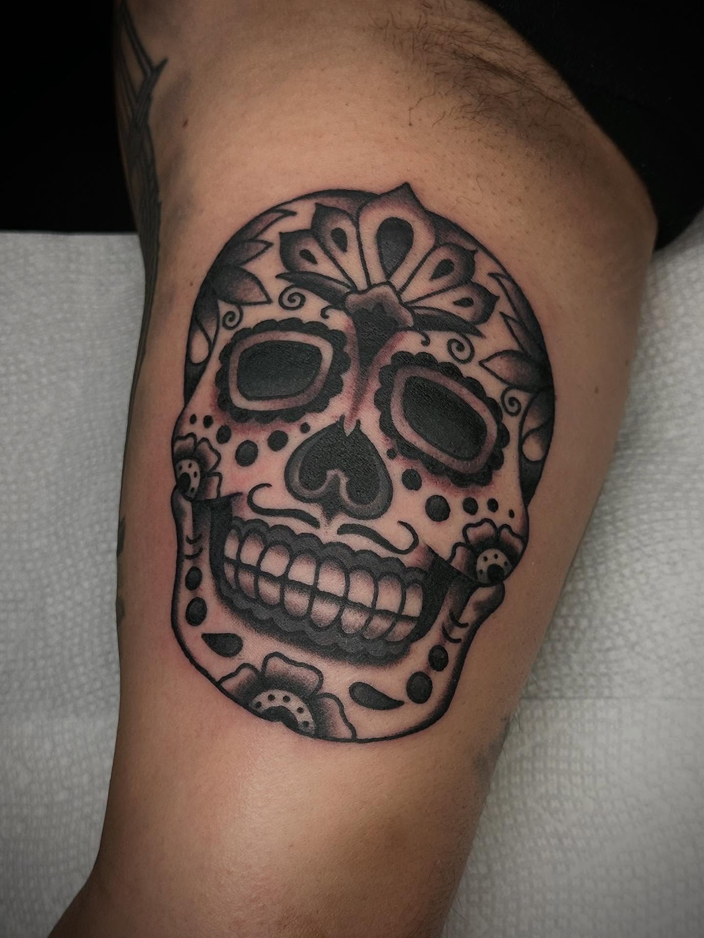 Sugar skull Chicano tattoo on the thigh by Tony Perez- Austin Texas Tattooer
