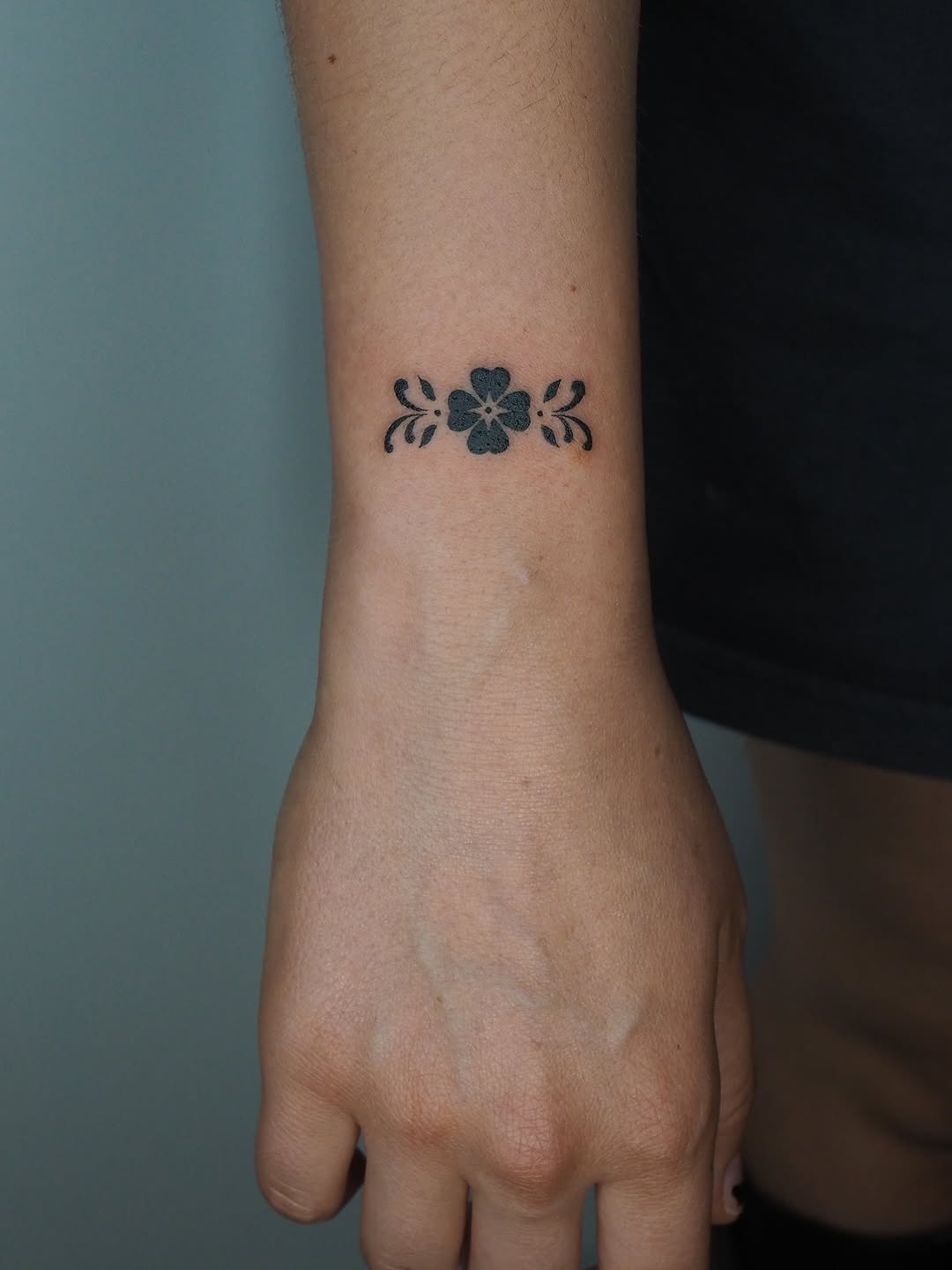 Clover and leaves ornamental tattoo on the forearm by A. Eye Tat