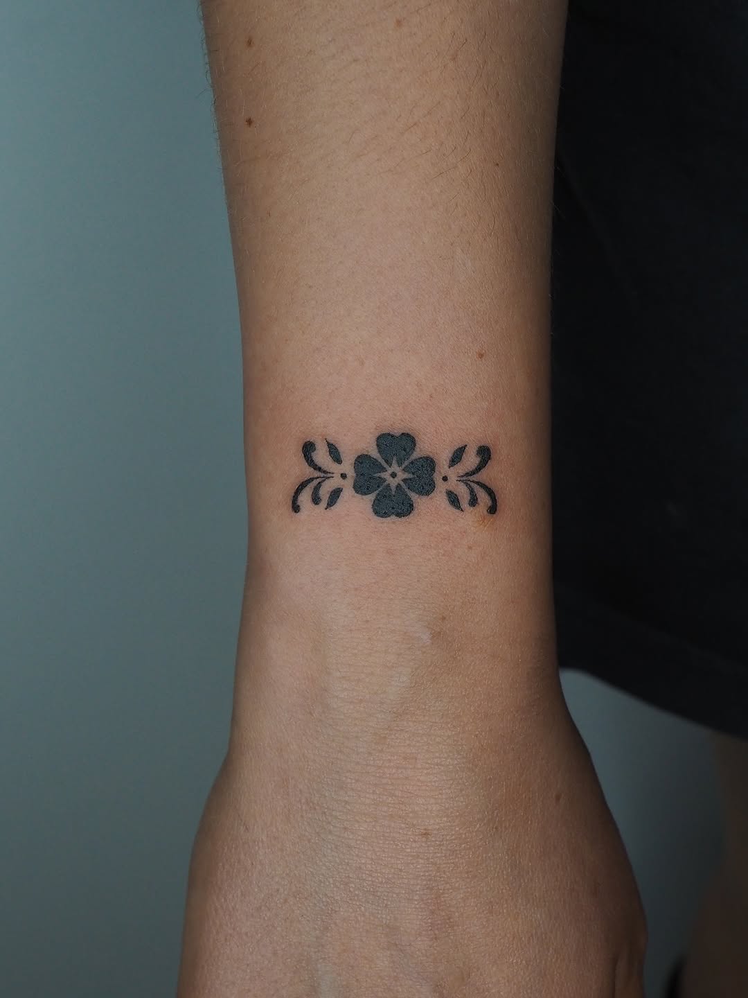 Clover and leaves ornamental tattoo on the forearm by A. Eye Tat
