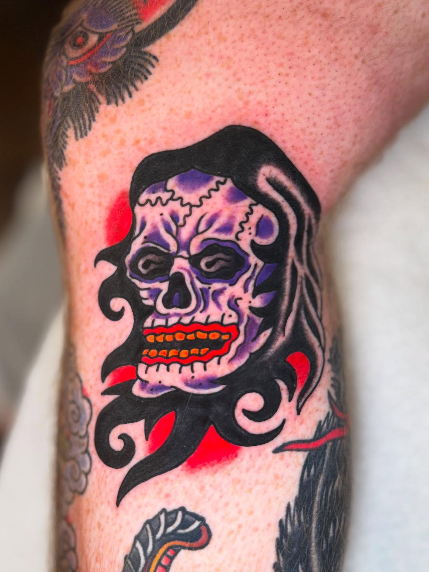 Skull American traditional tattoo on the forearm by Seth Walker