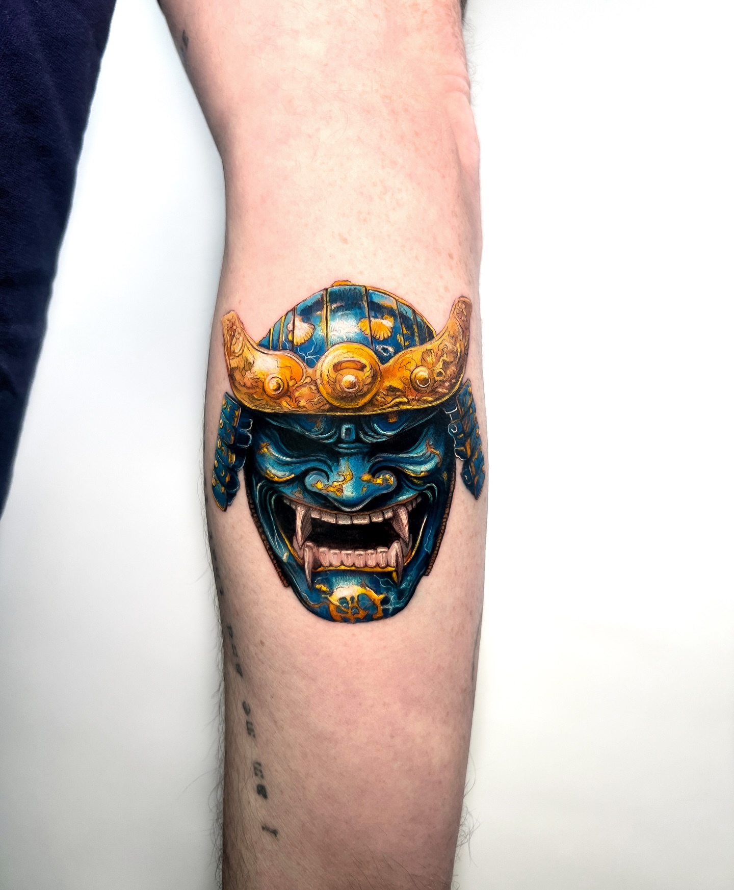 Mask japanese irezumi tattoo on the forearm by serenay akçiçek