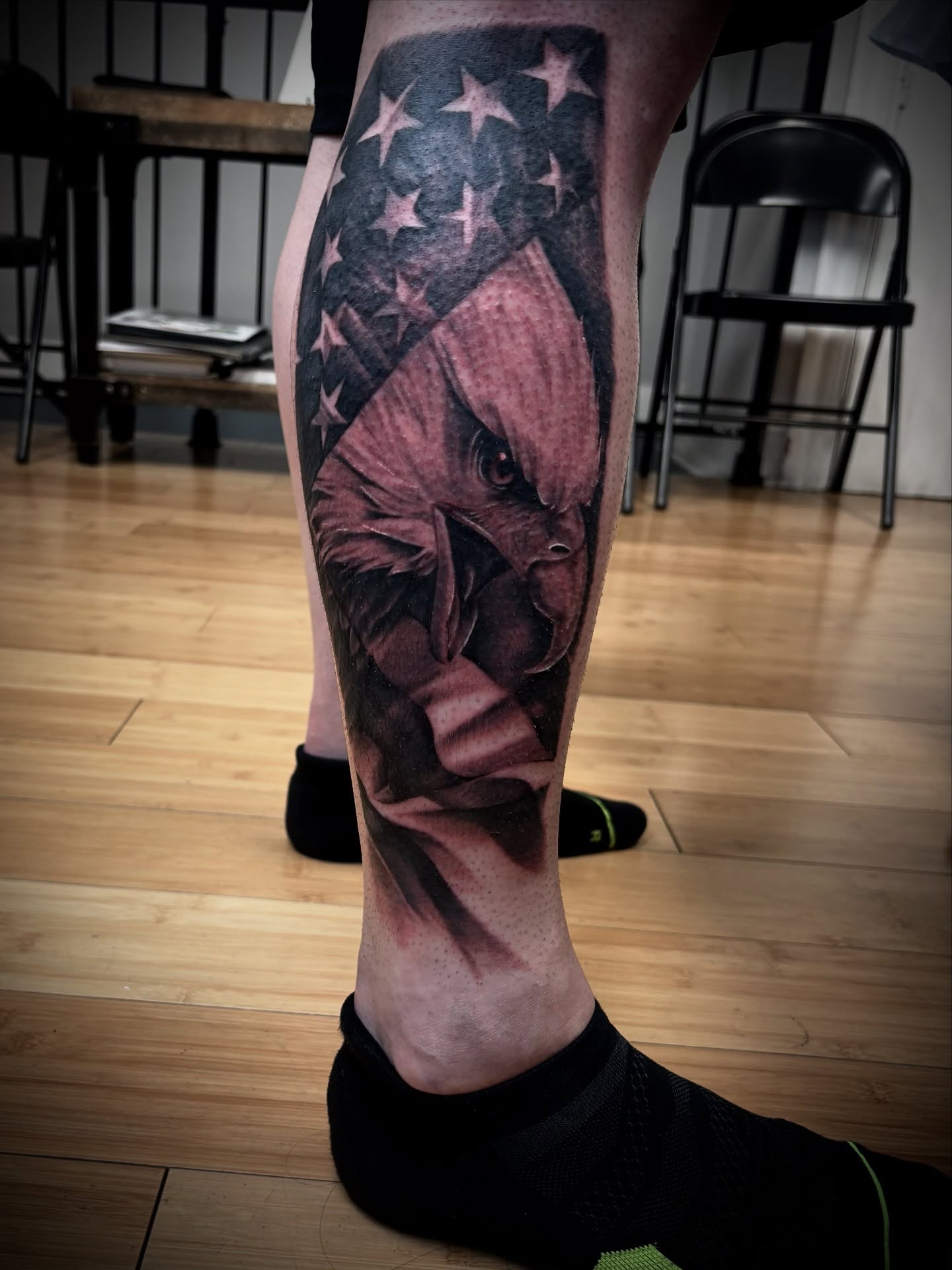 American flag eagle realism tattoo on the calf by Ty East