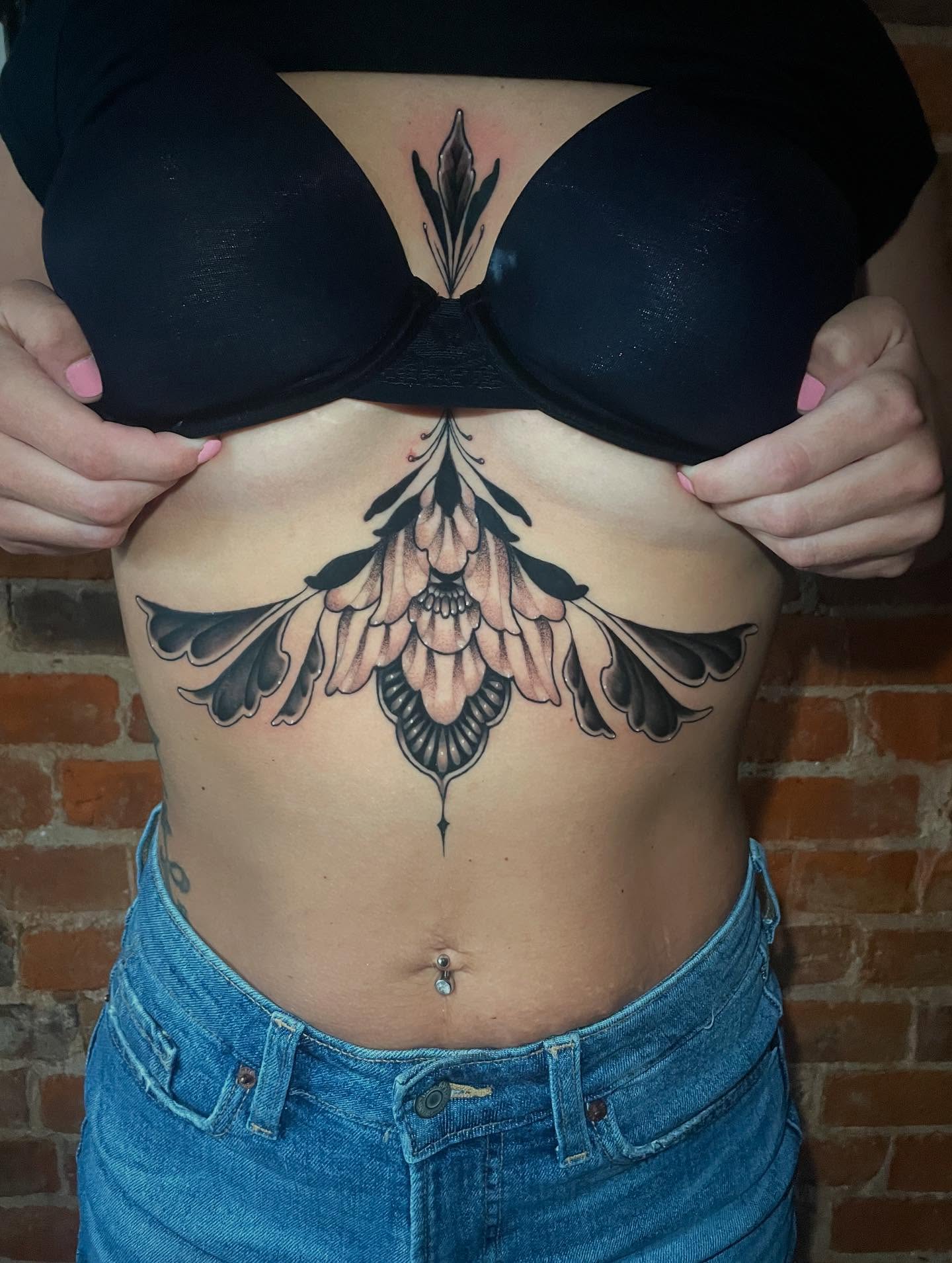 Floral ornamental tattoo on the torso by Auzzy the Ink Pirate, Mansfield, Ohio