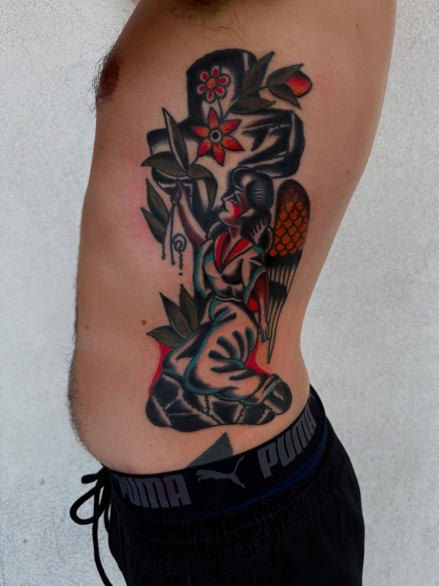 Geisha with flowers American traditional tattoo on the thigh by Noah Diffenderfer, Phoenix, Arizona
