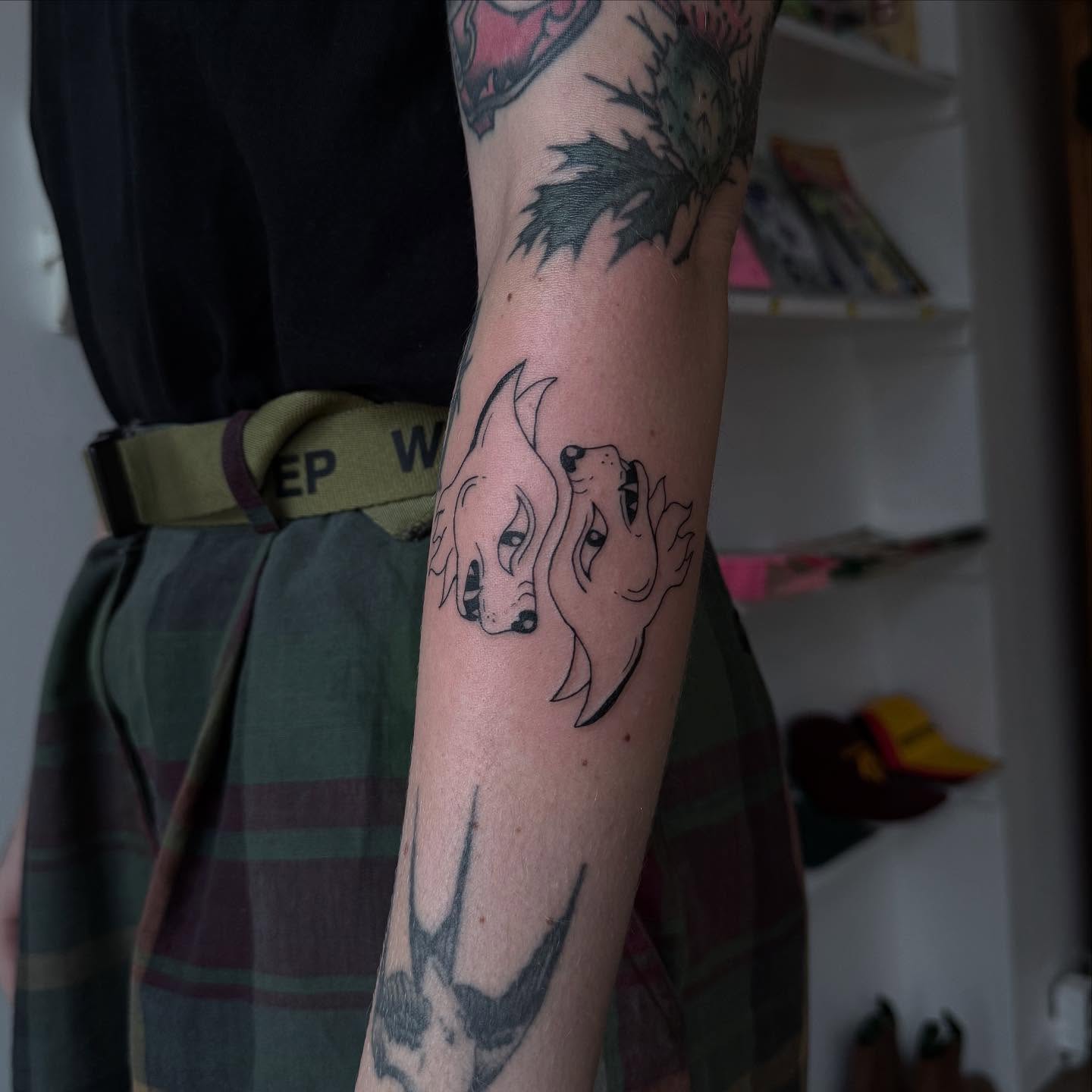 Two dogs black and grey tattoo on the forearm by house0fsleep 💤
