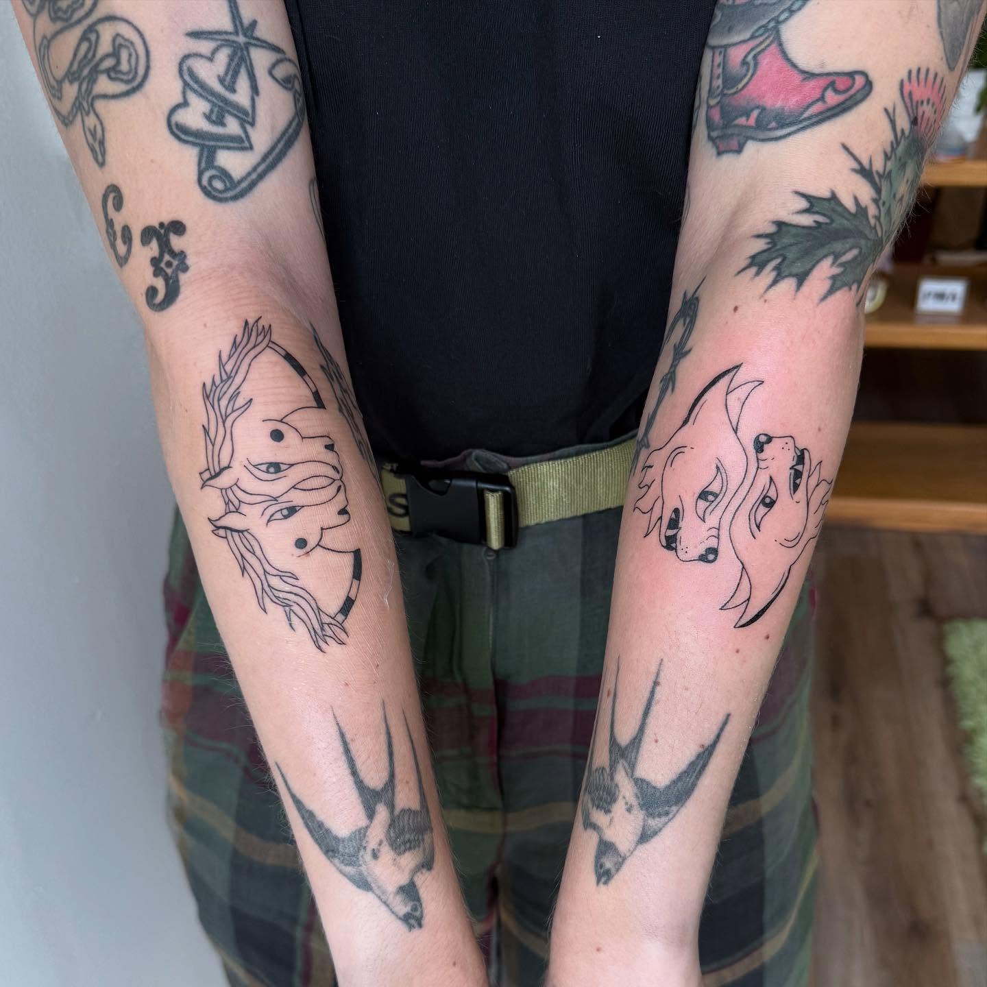 Animal faces black and grey tattoo on the forearm by house0fsleep 💤