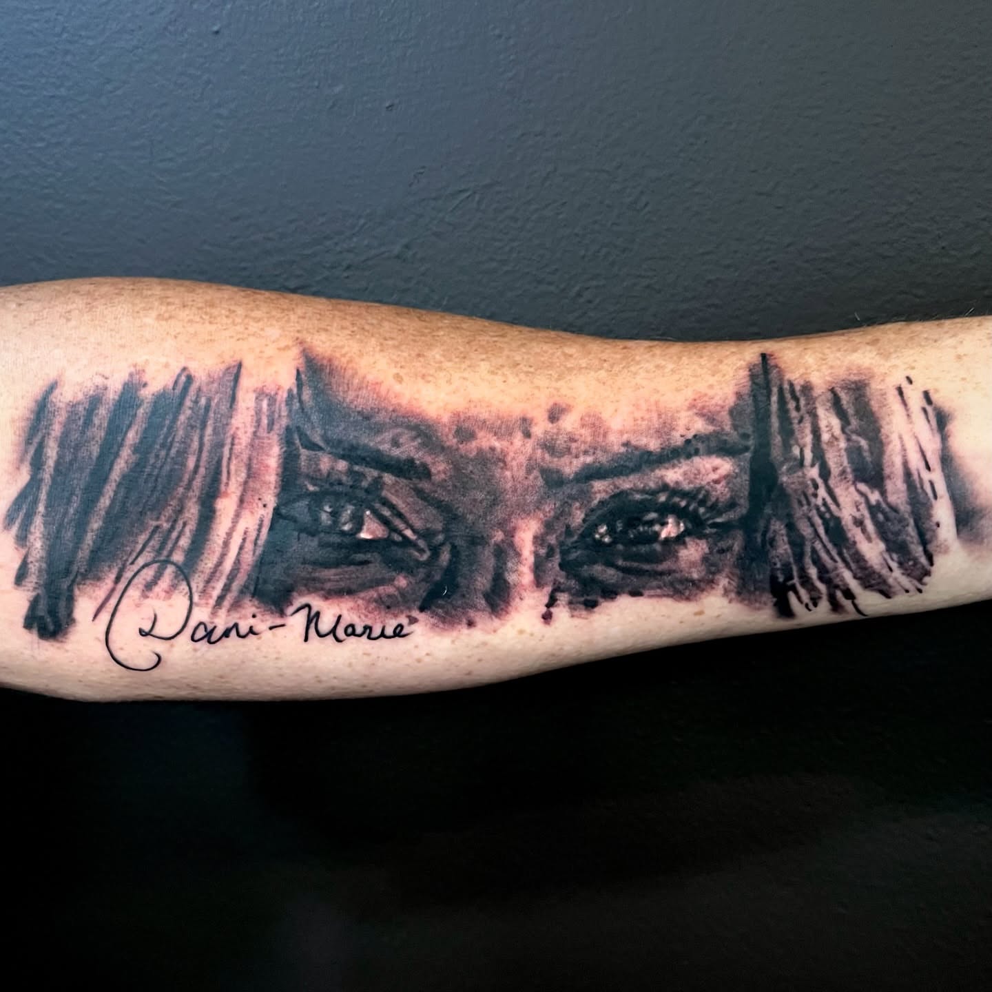 Eyes realism tattoo on the forearm by Brennan Freemantle
