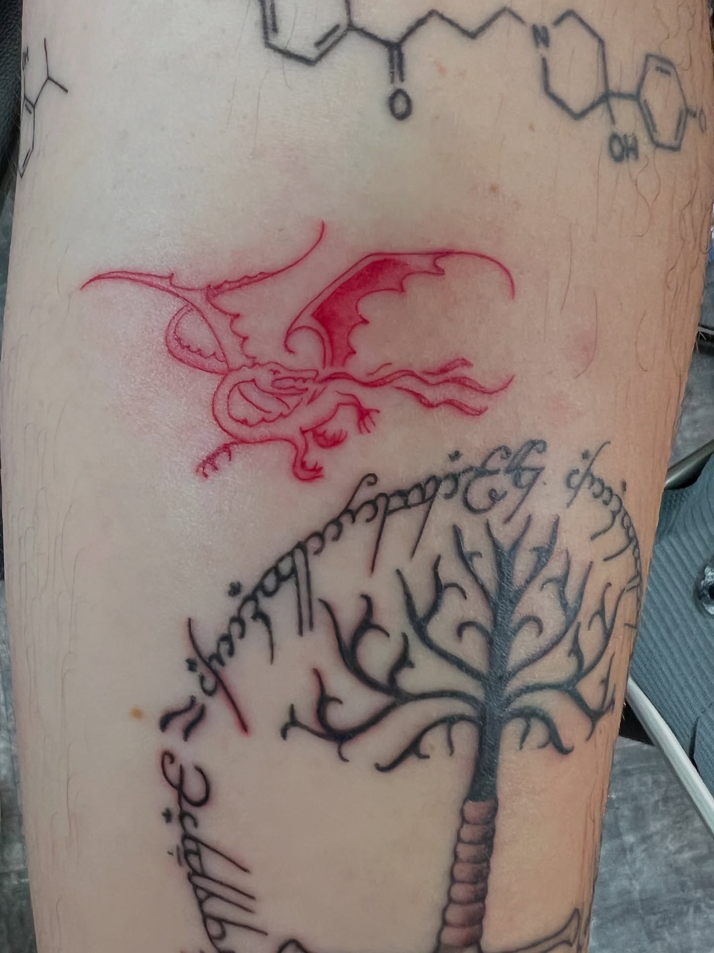 Dragon and tree fine line tattoo on the forearm by Cortnie, Nashville, Tennessee