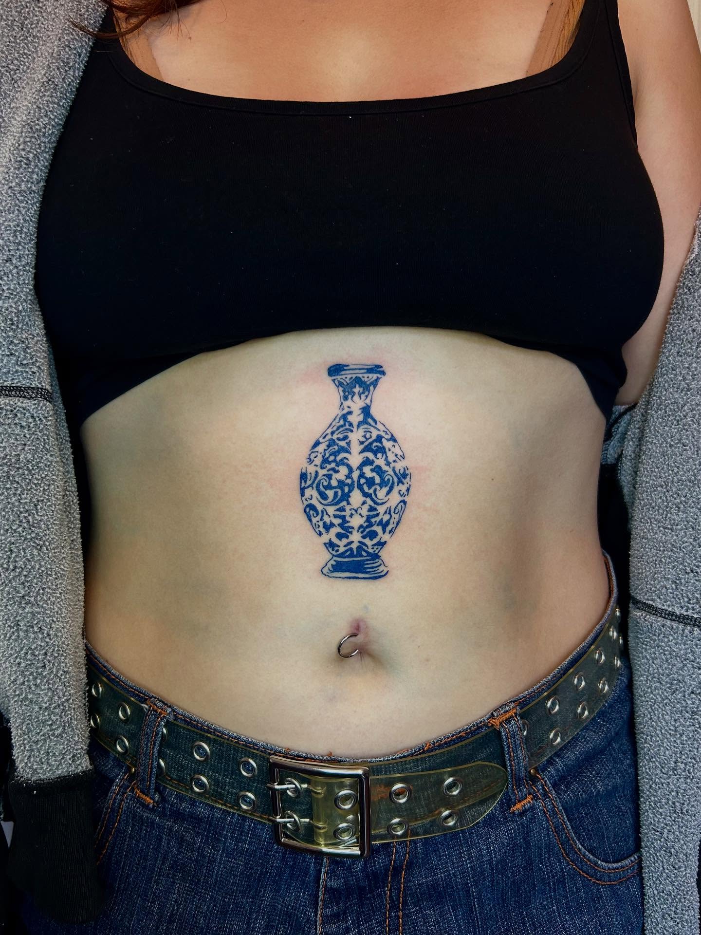 Vase ornamental tattoo on the torso by (isa)ac ૮₍ ˃̵ࡇ˂̵ ₎ა