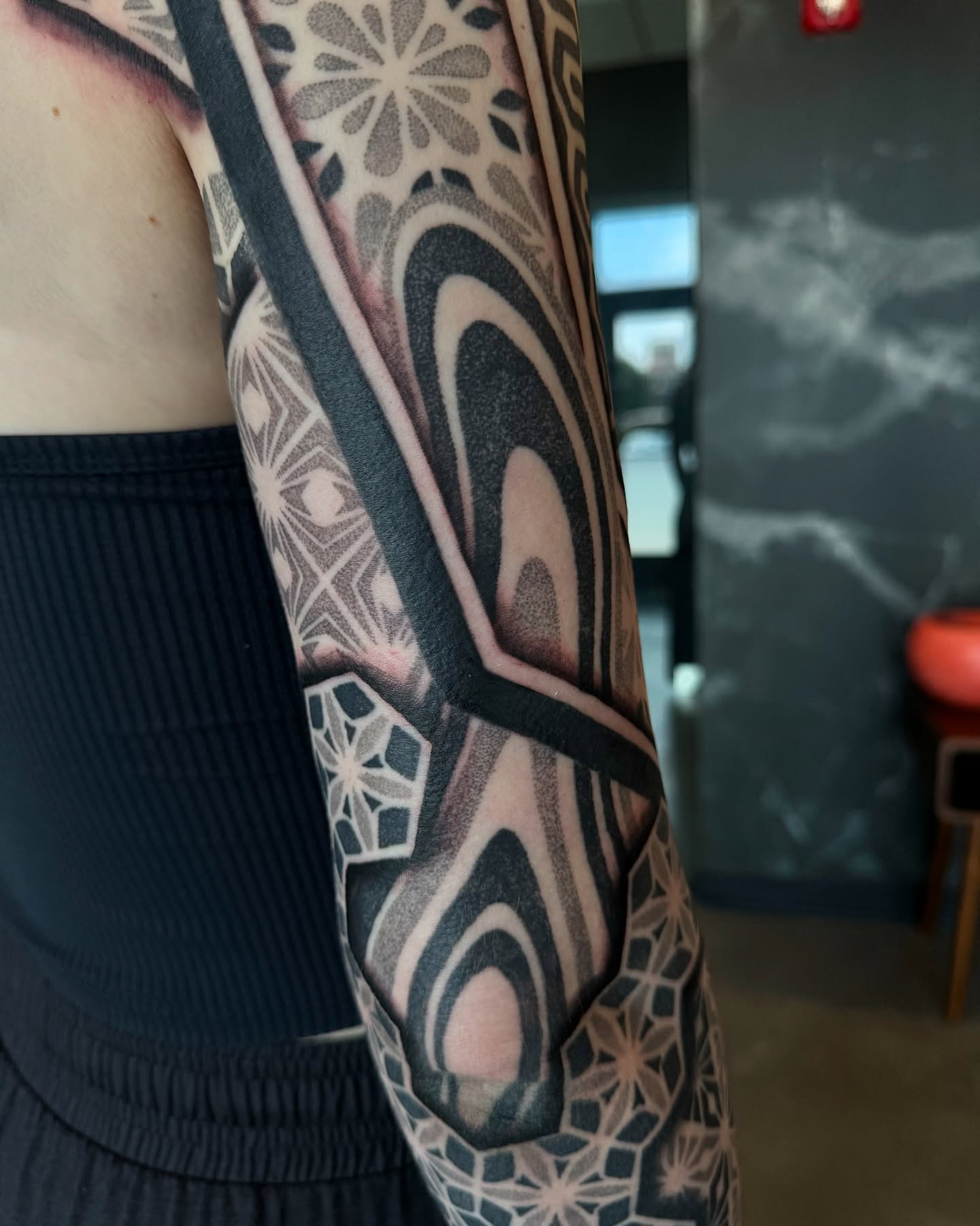 Geometric pattern geometric tattoo on the forearm by Christofer Irvin