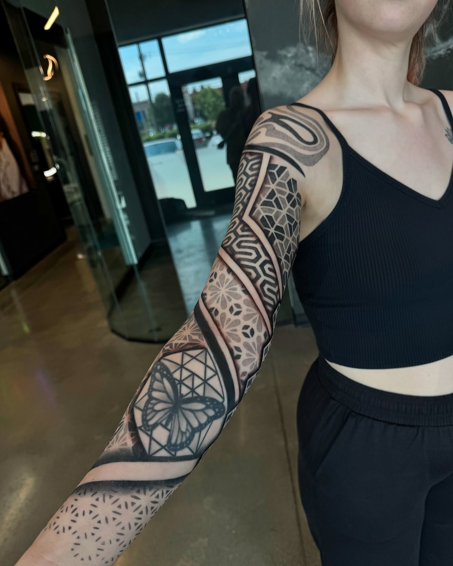 Geometric patterns geometric tattoo on the upper arm by Christofer Irvin