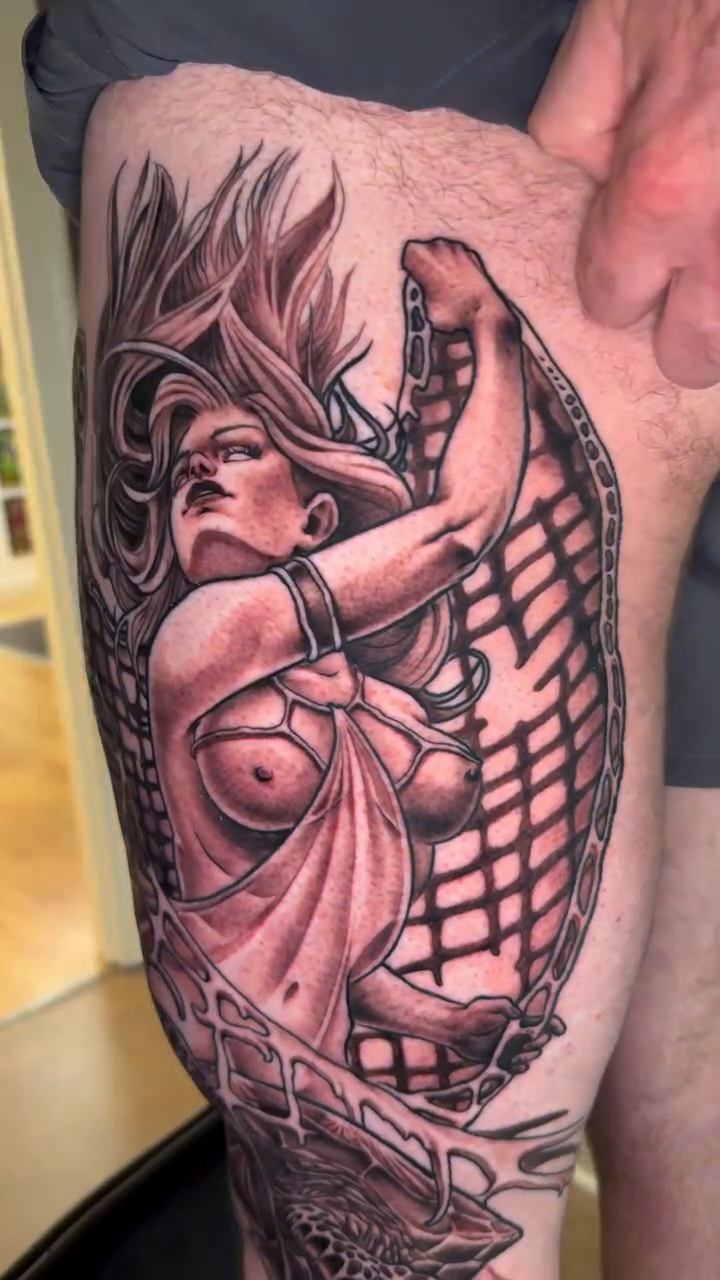 Woman and snake realism tattoo by Matti Hixson