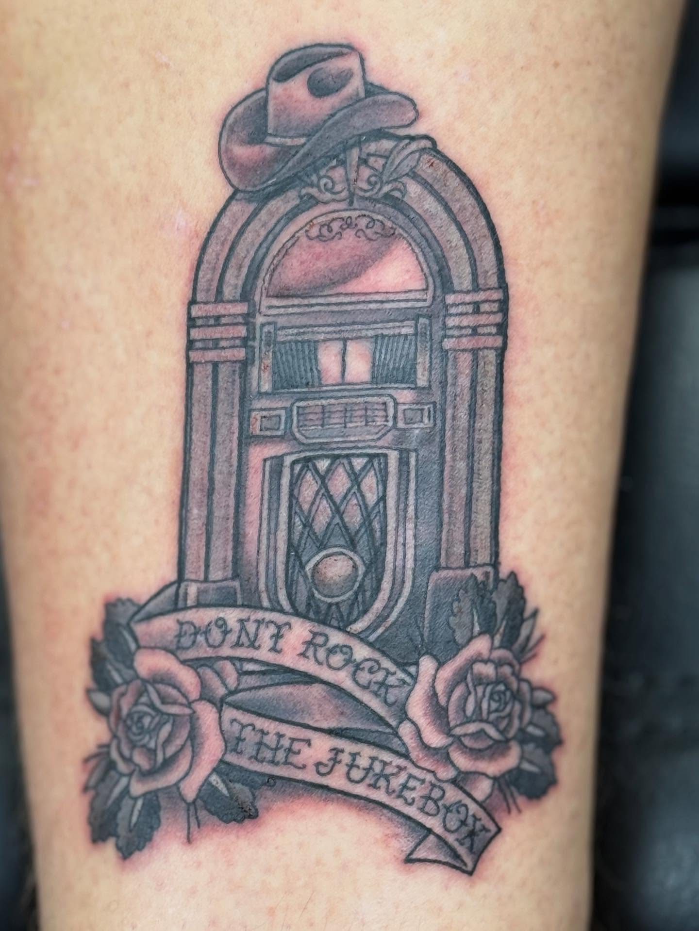 Jukebox American traditional tattoo on the thigh by Aaron Hassler, Nashville, Tennessee