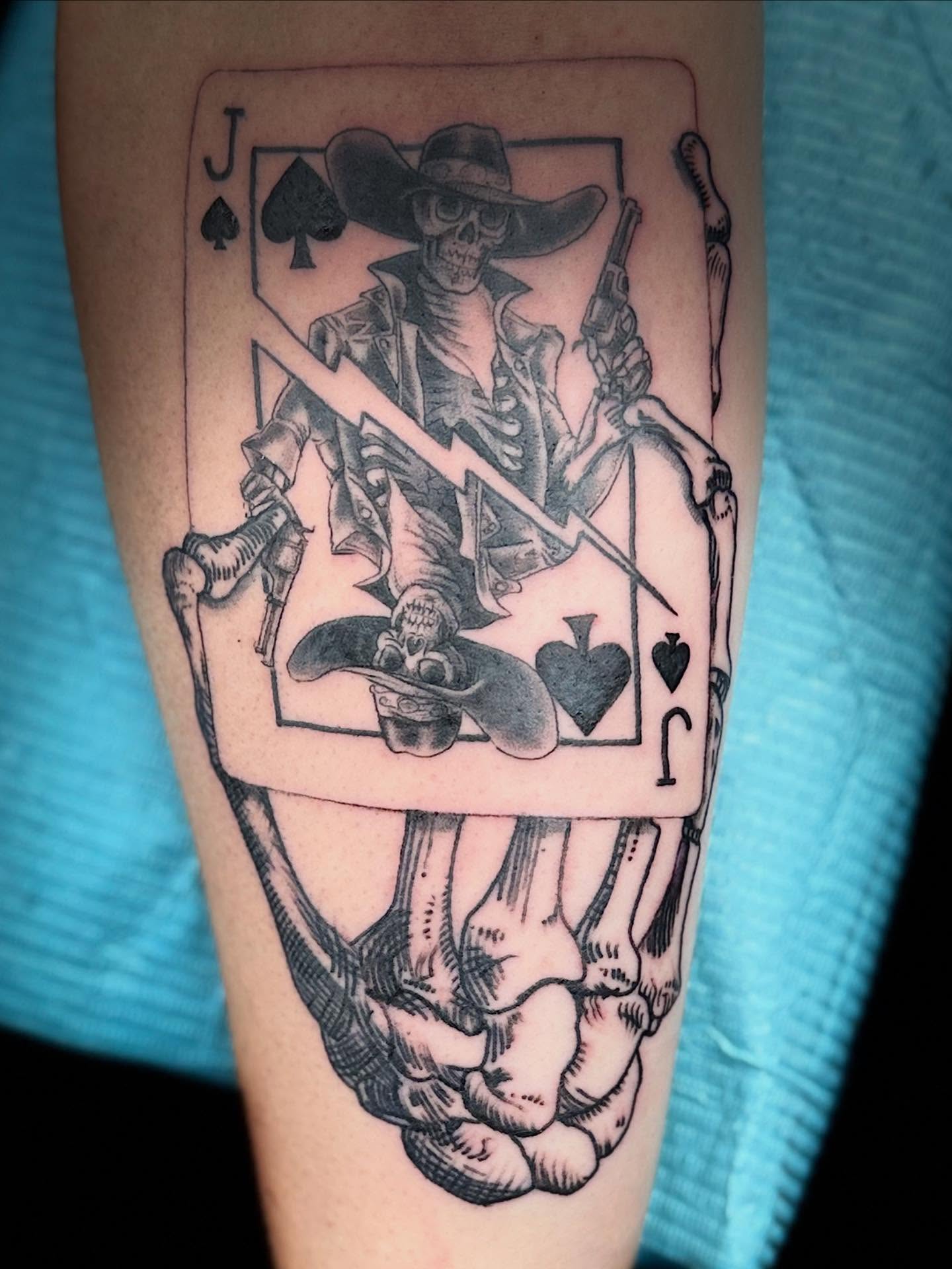 Jack of spades skeleton realism tattoo on the forearm by Aaron Hassler, Nashville, Tennessee