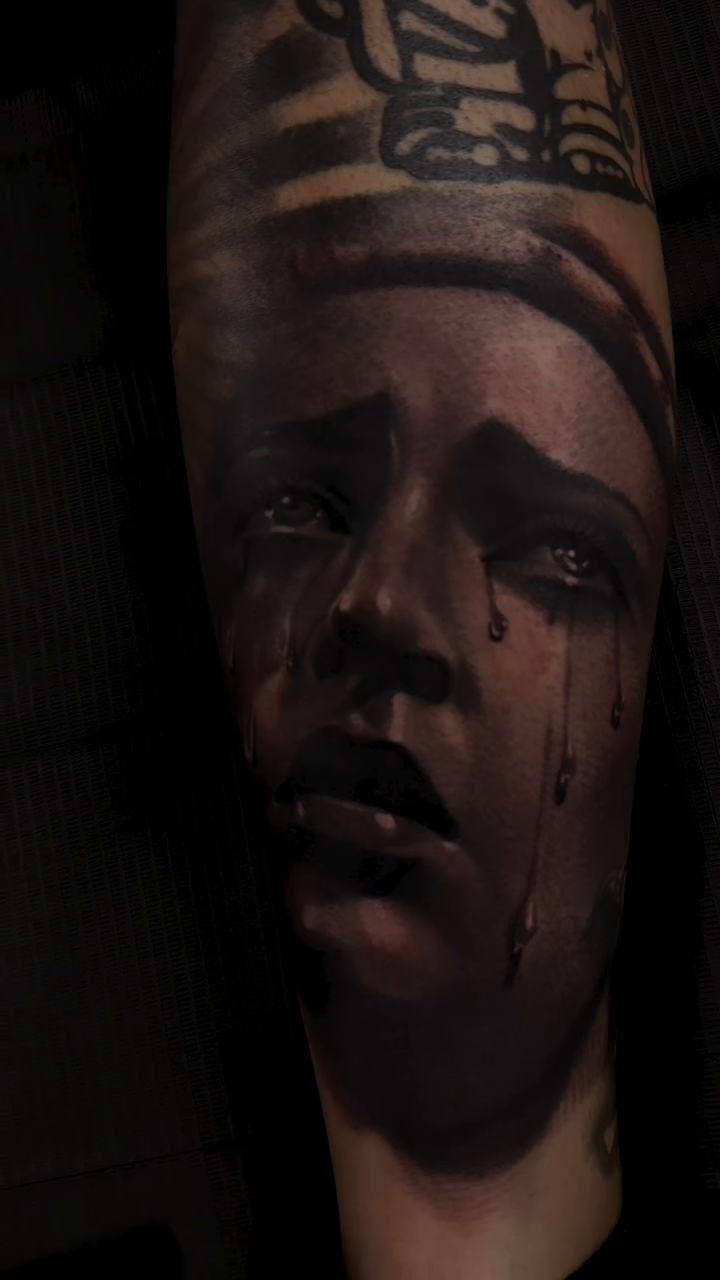 Crying woman with crown realism tattoo by Jason Martinez