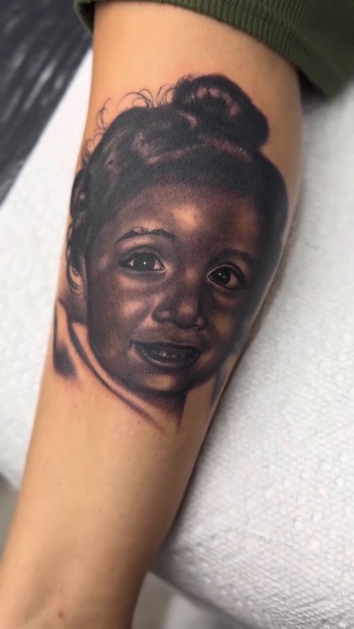 Child's portrait realism tattoo by Alex Romero