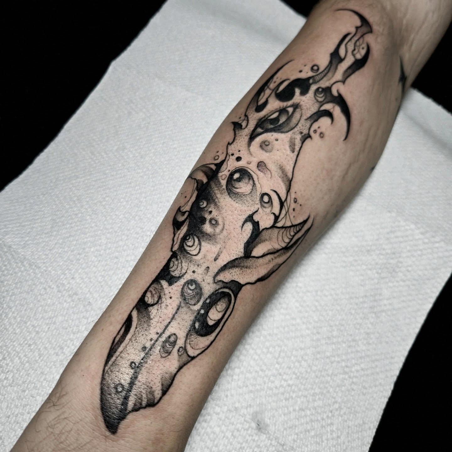 Octopus dotwork tattoo on the forearm by Ema Fish