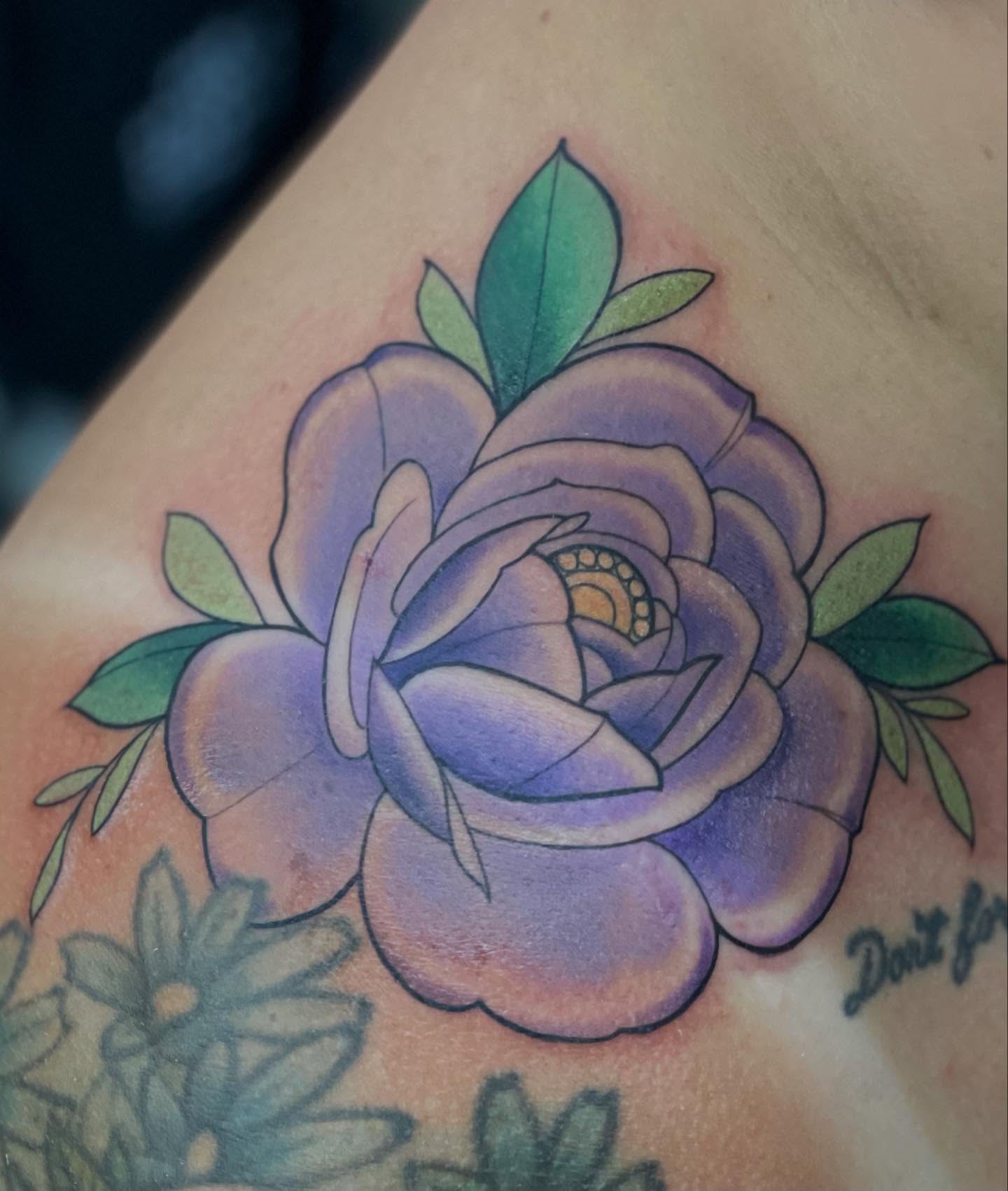 Purple rose American traditional tattoo on the upper arm by ๐ณ๐๐๐๐ข ๐ต๐๐๐๐๐๐