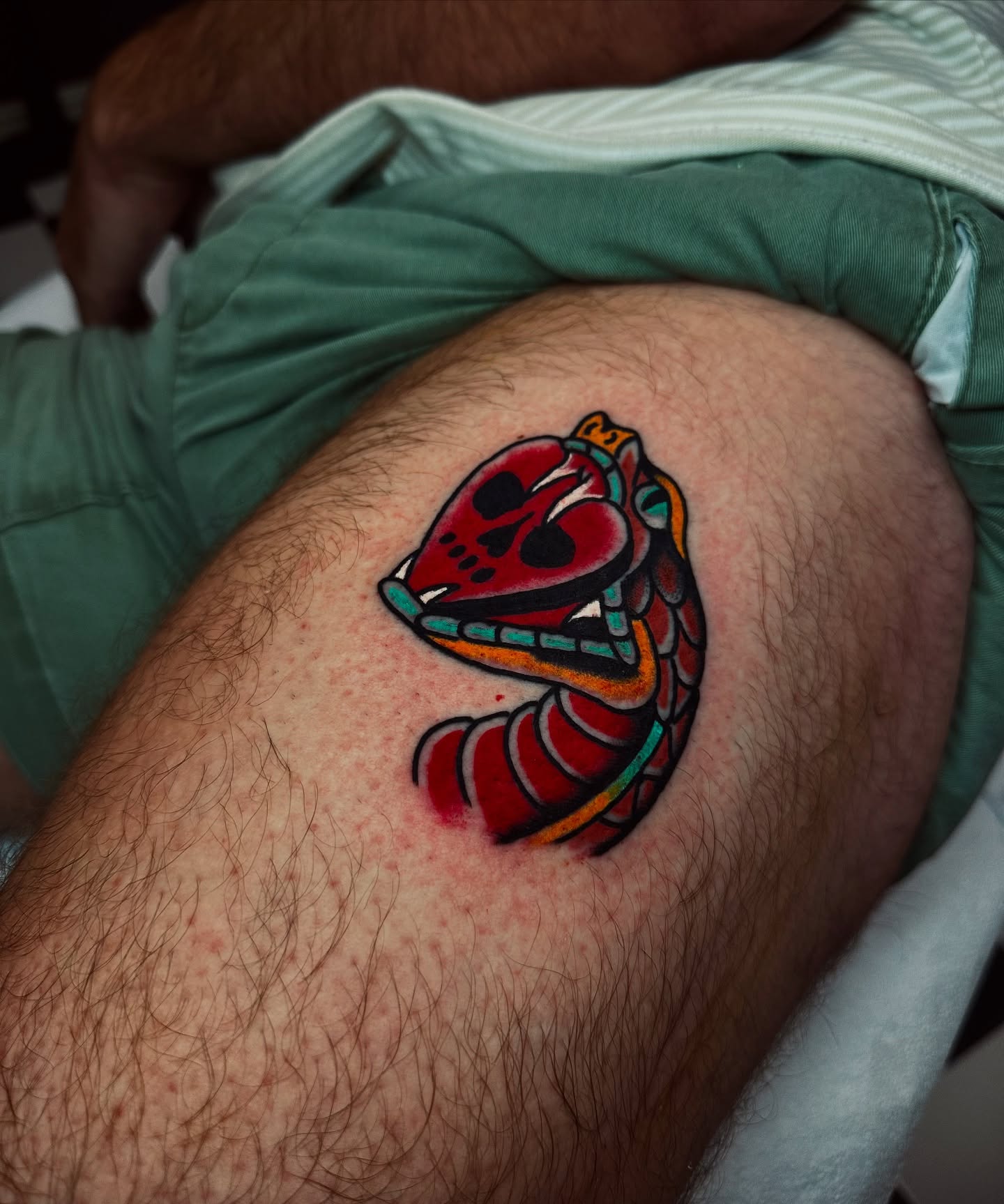 Snake American traditional tattoo on the thigh by Matthew, Georgetown, Texas