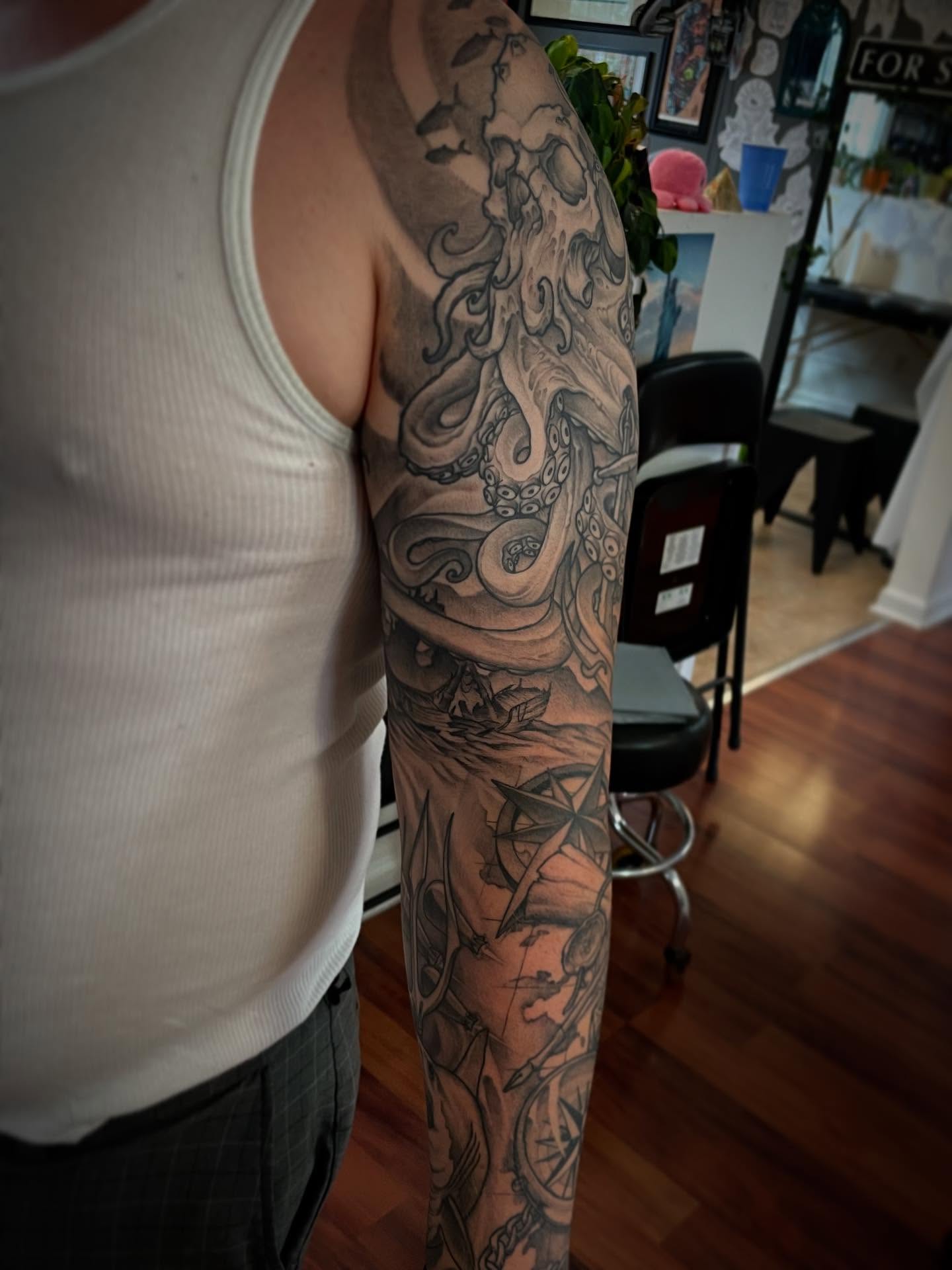 Tattoo by @wizardspits — black_and_grey, realism