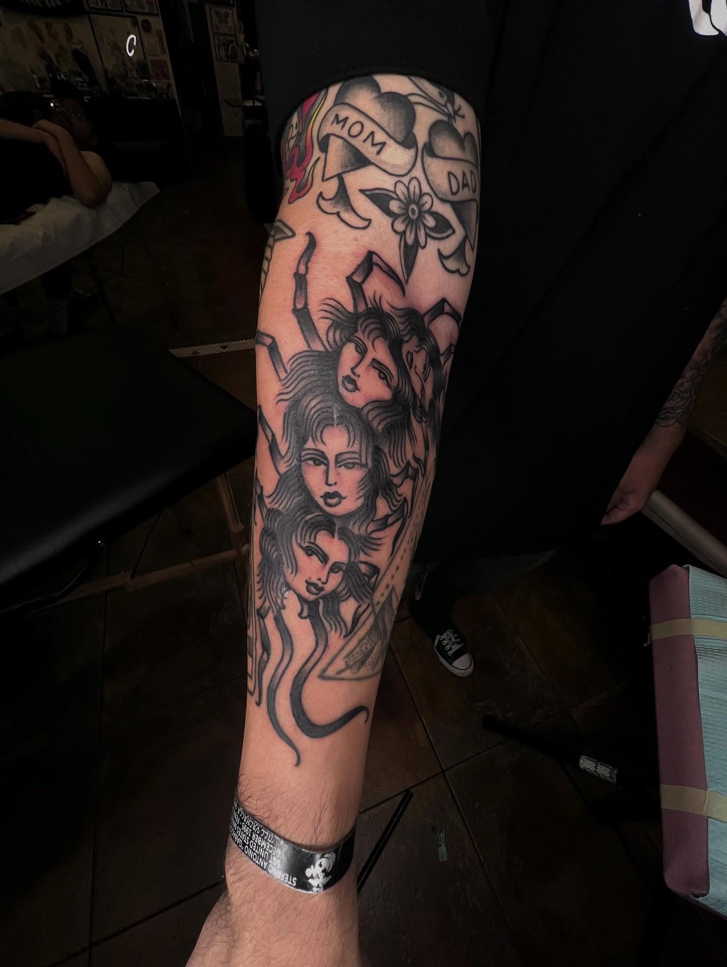 Female figures American traditional tattoo on the forearm by Mika Clairissa