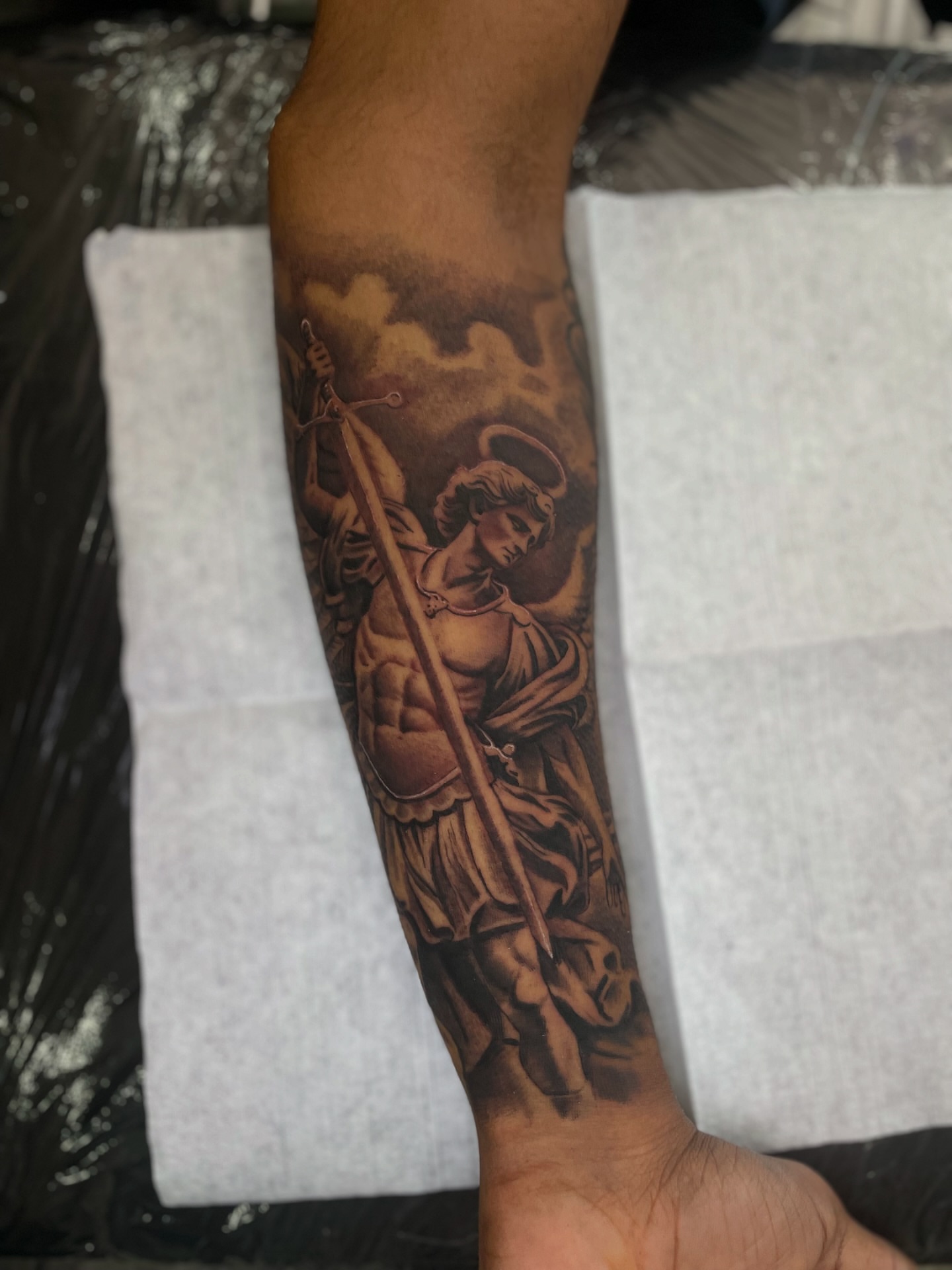 St. george slaying dragon realism tattoo on the forearm by Vic