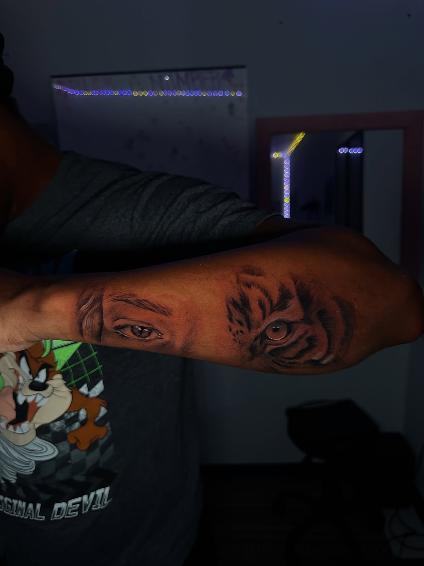 Tiger face realism tattoo on the forearm by Chris (Pikasso)
