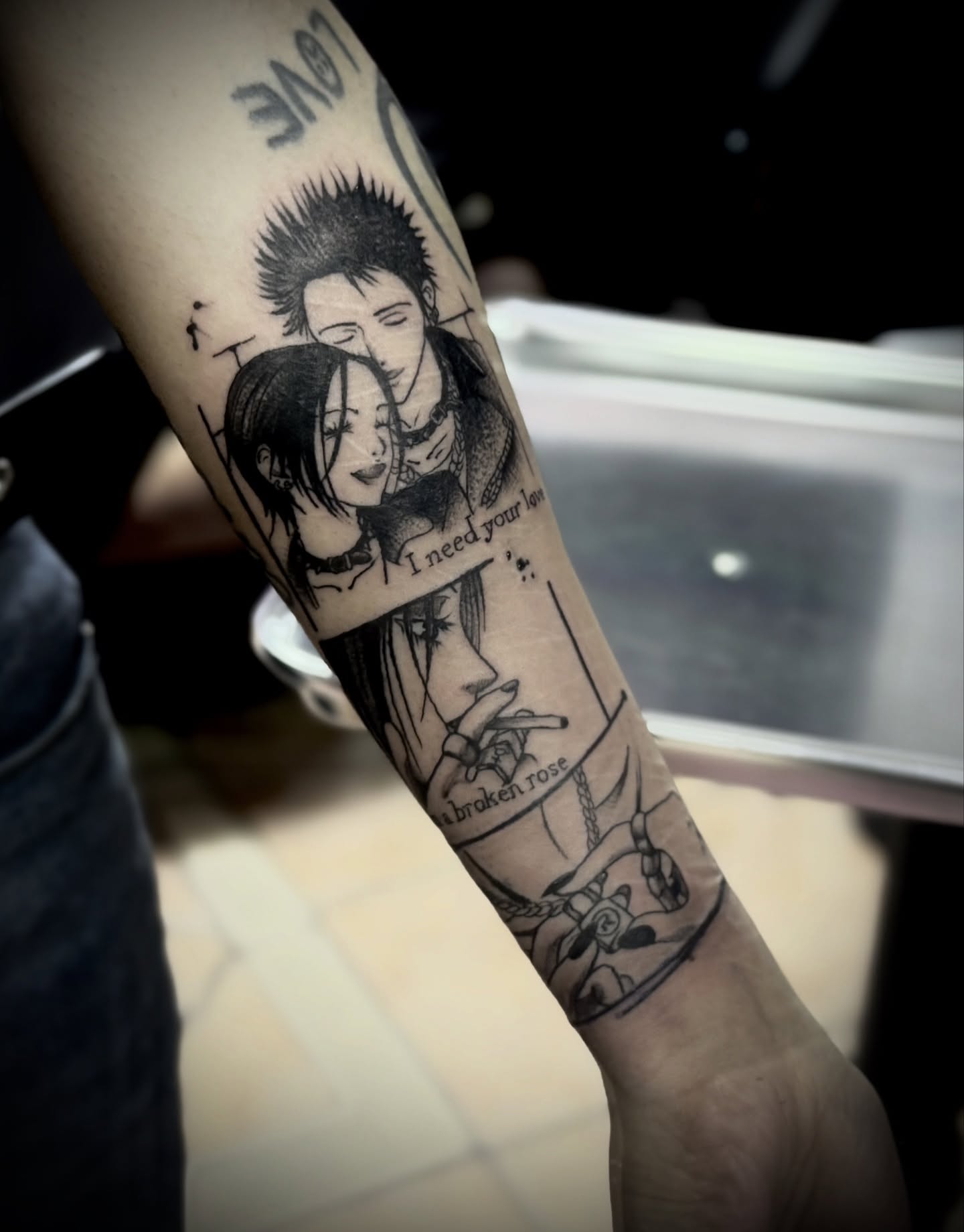 Couple and roses realism tattoo on the forearm by Tattoo Artist based in Dallas Tx