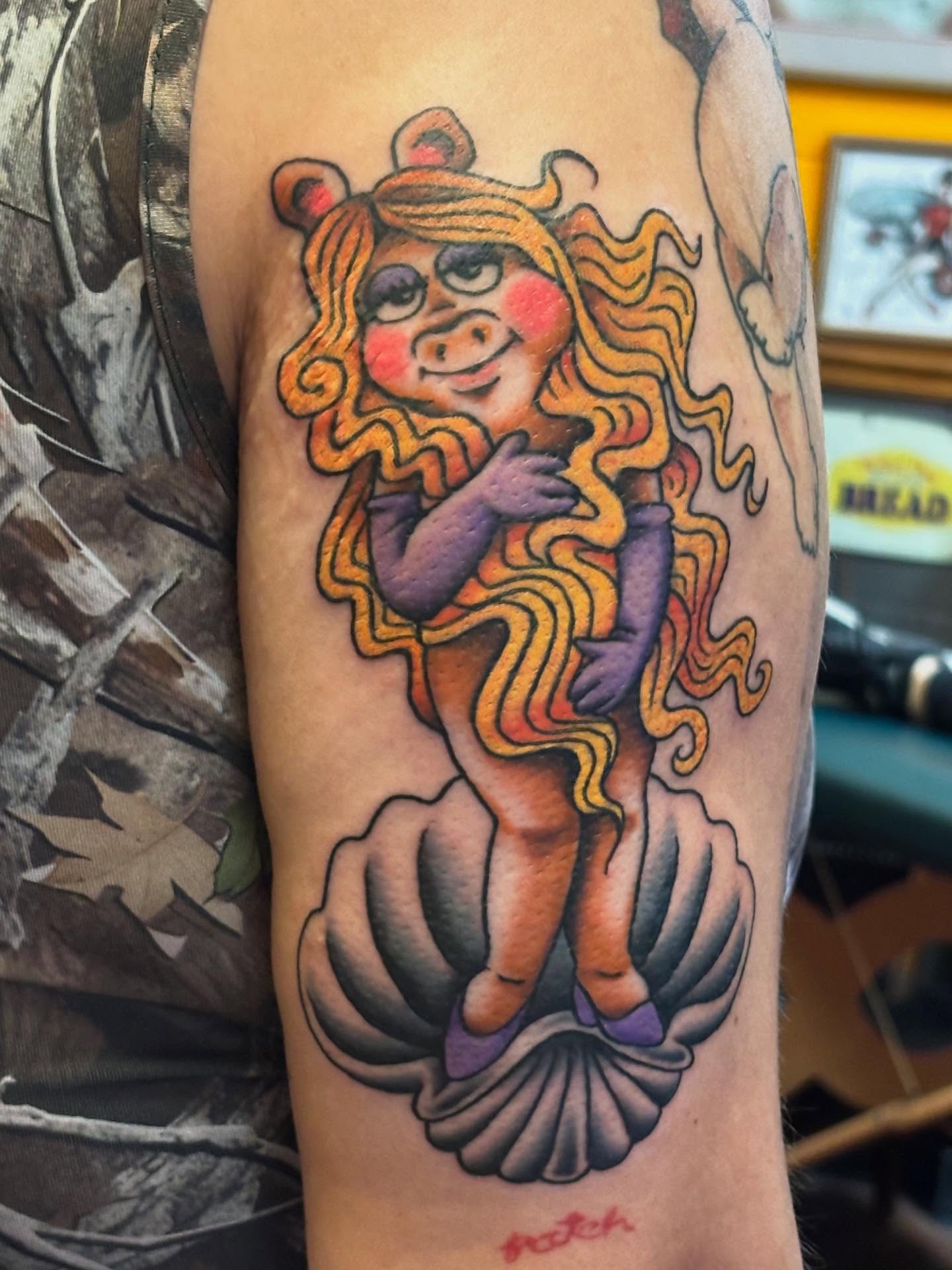 Piglet character new school tattoo on the forearm by Angie Isbell