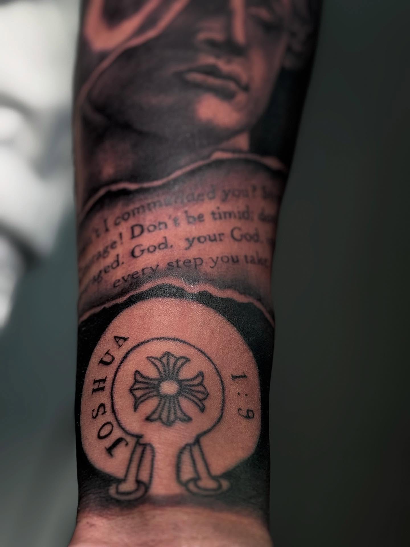 Religious symbolism realism tattoo on the forearm by caleb coley