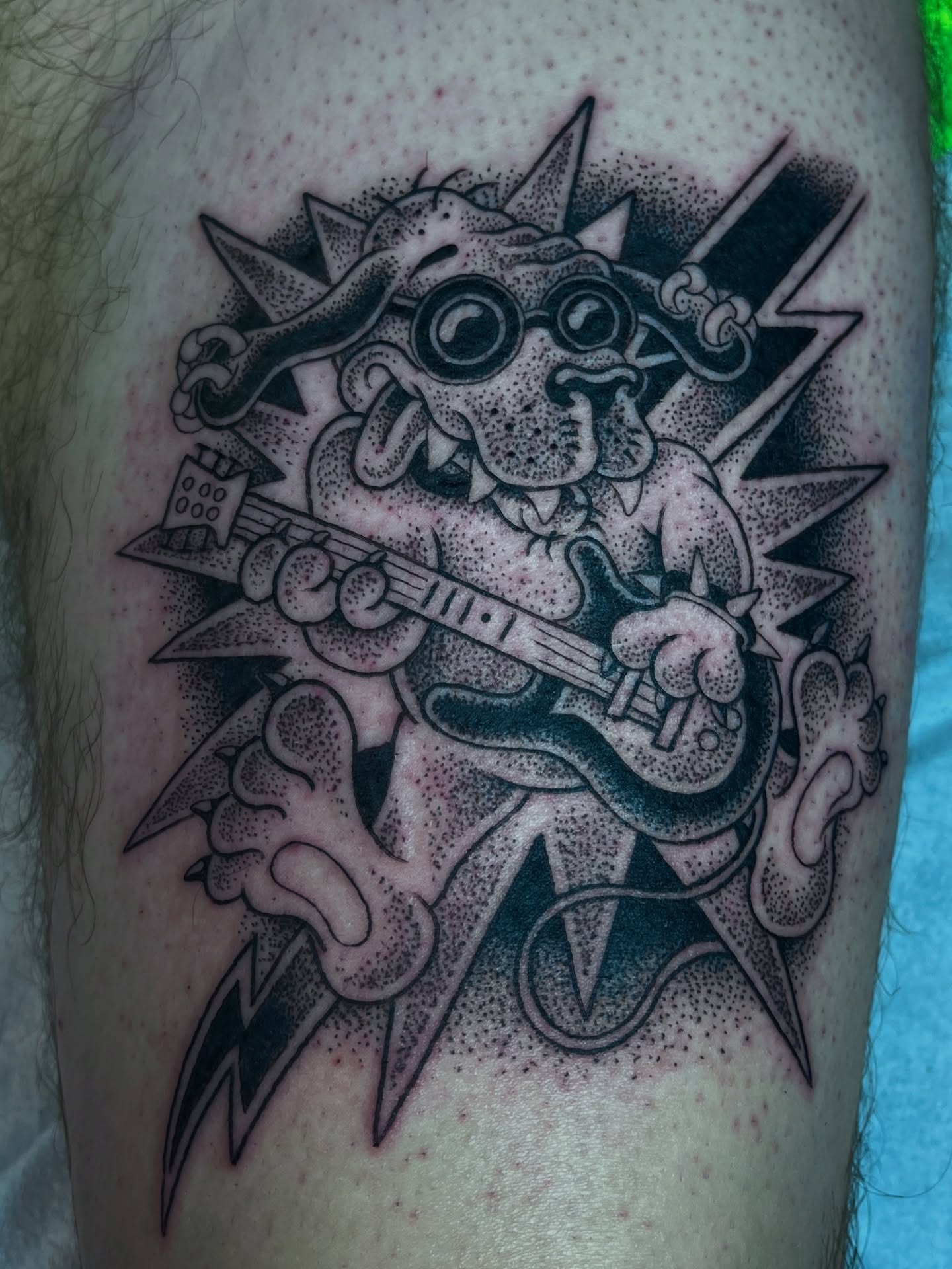 Cat playing guitar dotwork tattoo on the forearm by ☠︎ ︎𝗘𝗩𝗔 ☠︎︎