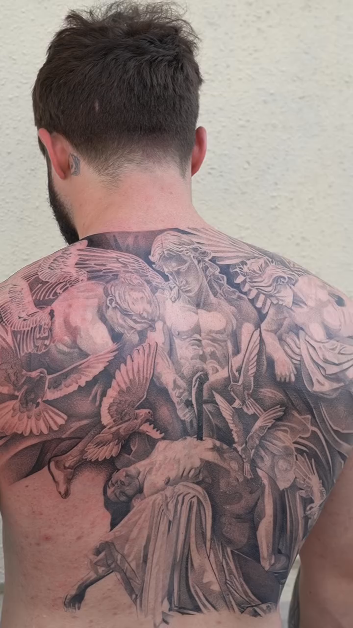 Angelic scene with figures and birds realism tattoo by sacramento tattoo CA