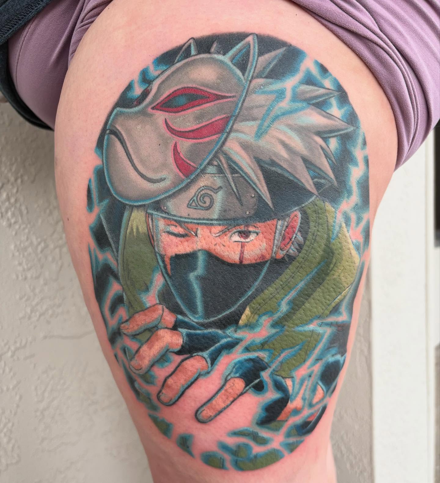 Anime character anime tattoo on the thigh by Jakob Ristau, Kansas City, Missouri