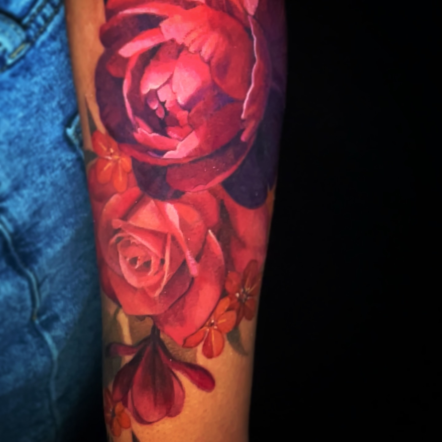 Roses realism tattoo on the forearm by Jordan