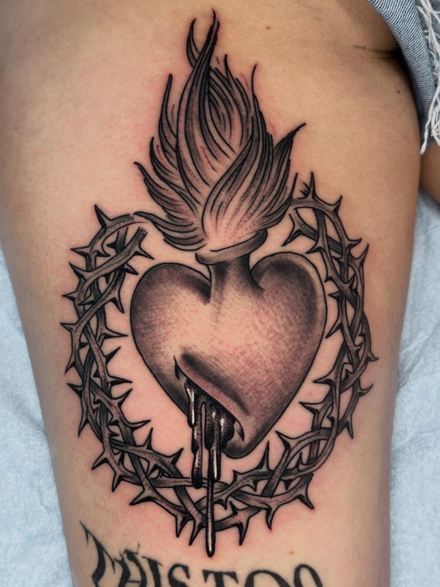 Heart with thorns black and grey tattoo on the thigh by David Steed, Dallas, Texas
