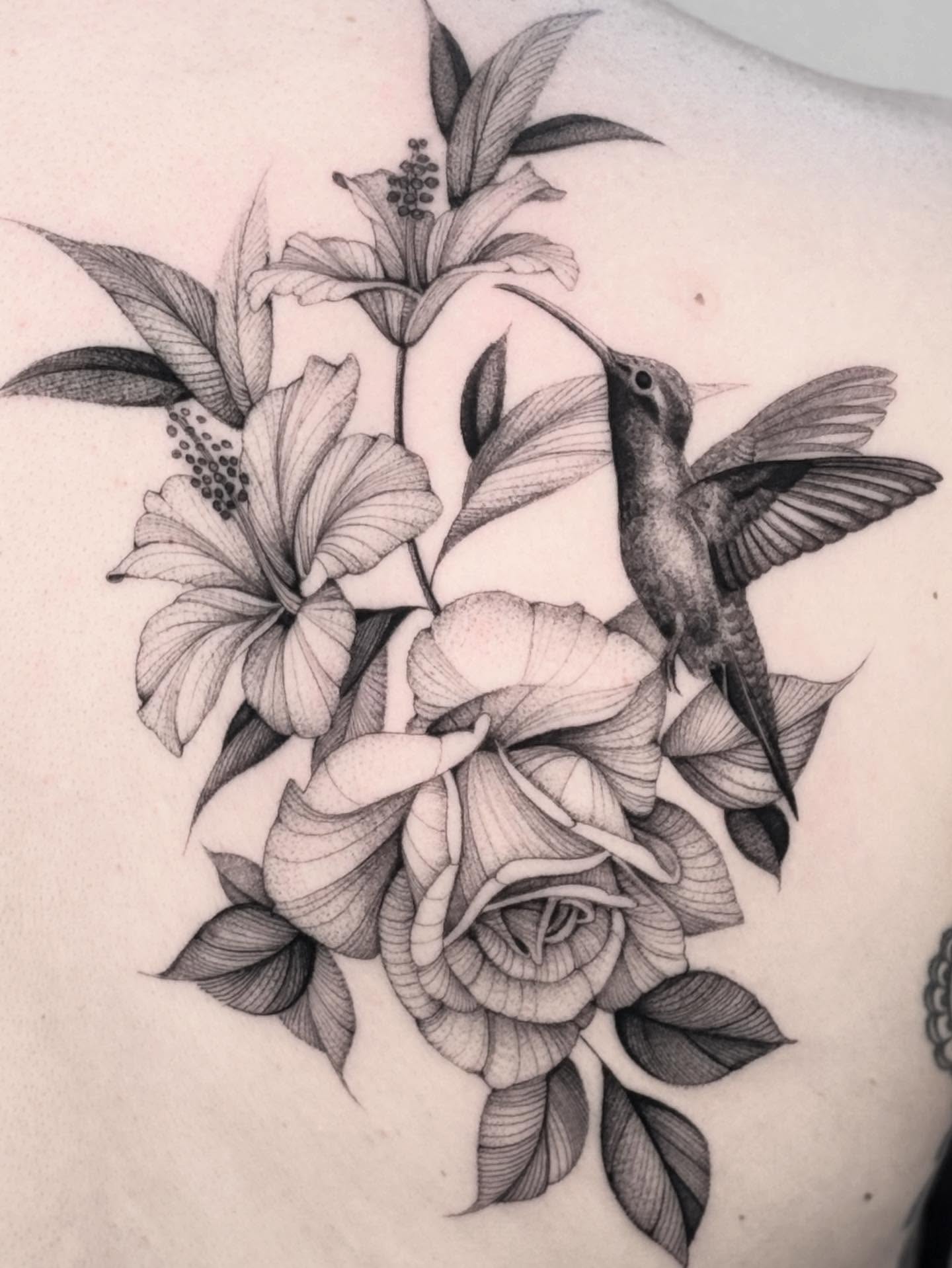 Hummingbird and flowers realism tattoo on the shoulder by Brittney Naami, San Francisco, California