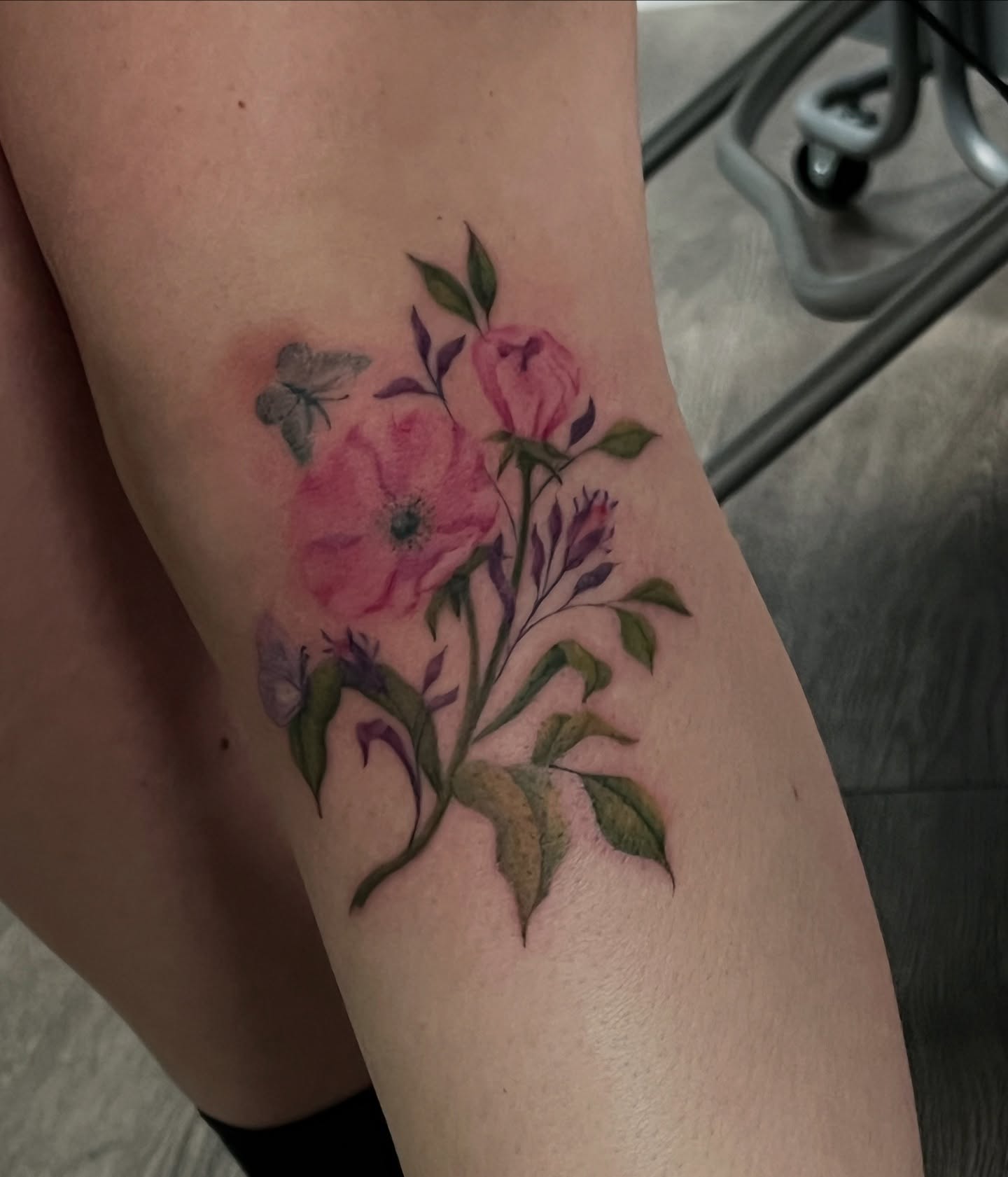 Flowers watercolor tattoo on the forearm by Cortnie, Nashville, Tennessee