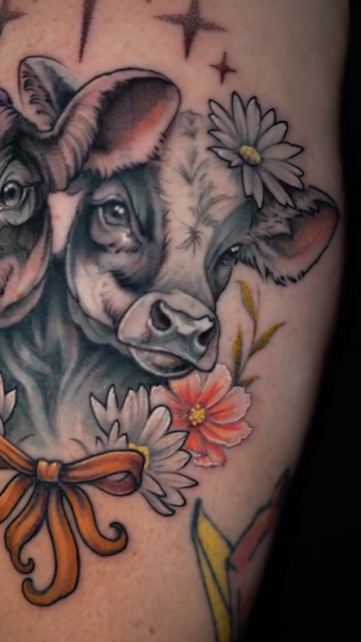 Cow and flower neo-traditional tattoo by Ashlynn Campbell