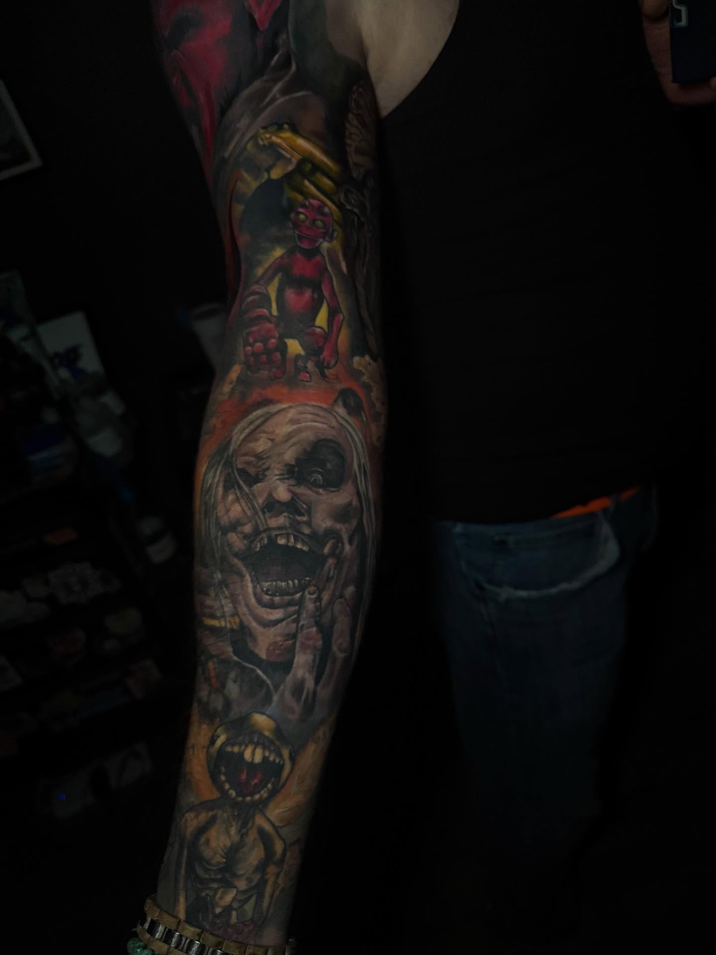 Horror characters sleeve realism tattoo on the forearm by Aaron Ysidro