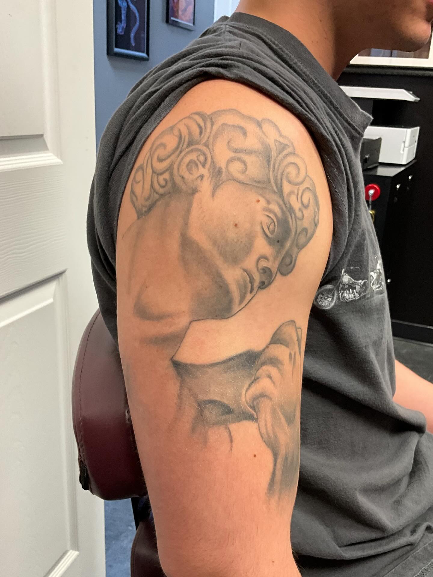 Medusa head realism tattoo on the shoulder by Chris Lochbihler