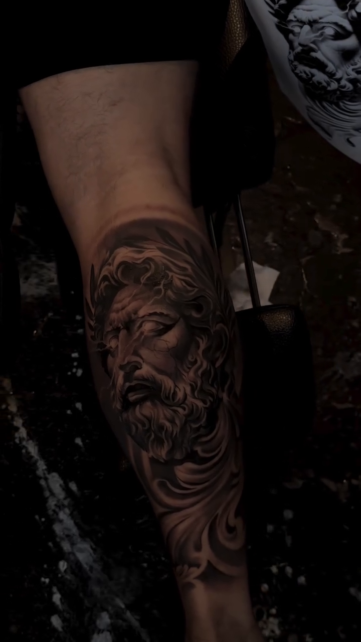 Tattoo by @tattoo_ravay — realism, black_and_grey