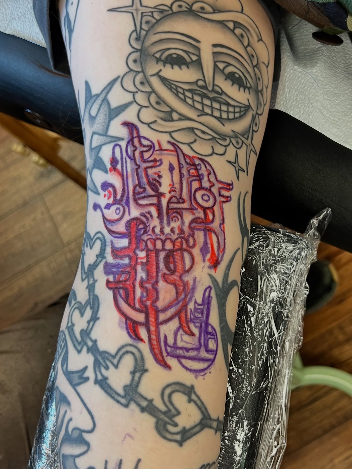 Solar deity American traditional tattoo on the forearm by Brian DiCola Tattooer