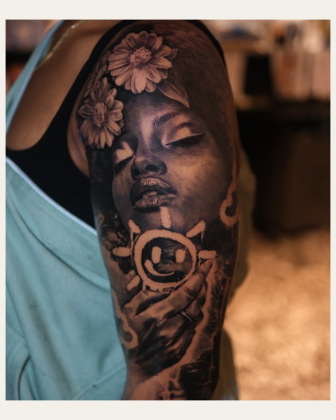 Woman with flowers realism tattoo on the forearm by Joel: Boston Tattoo Artist, Boston, Massachusetts