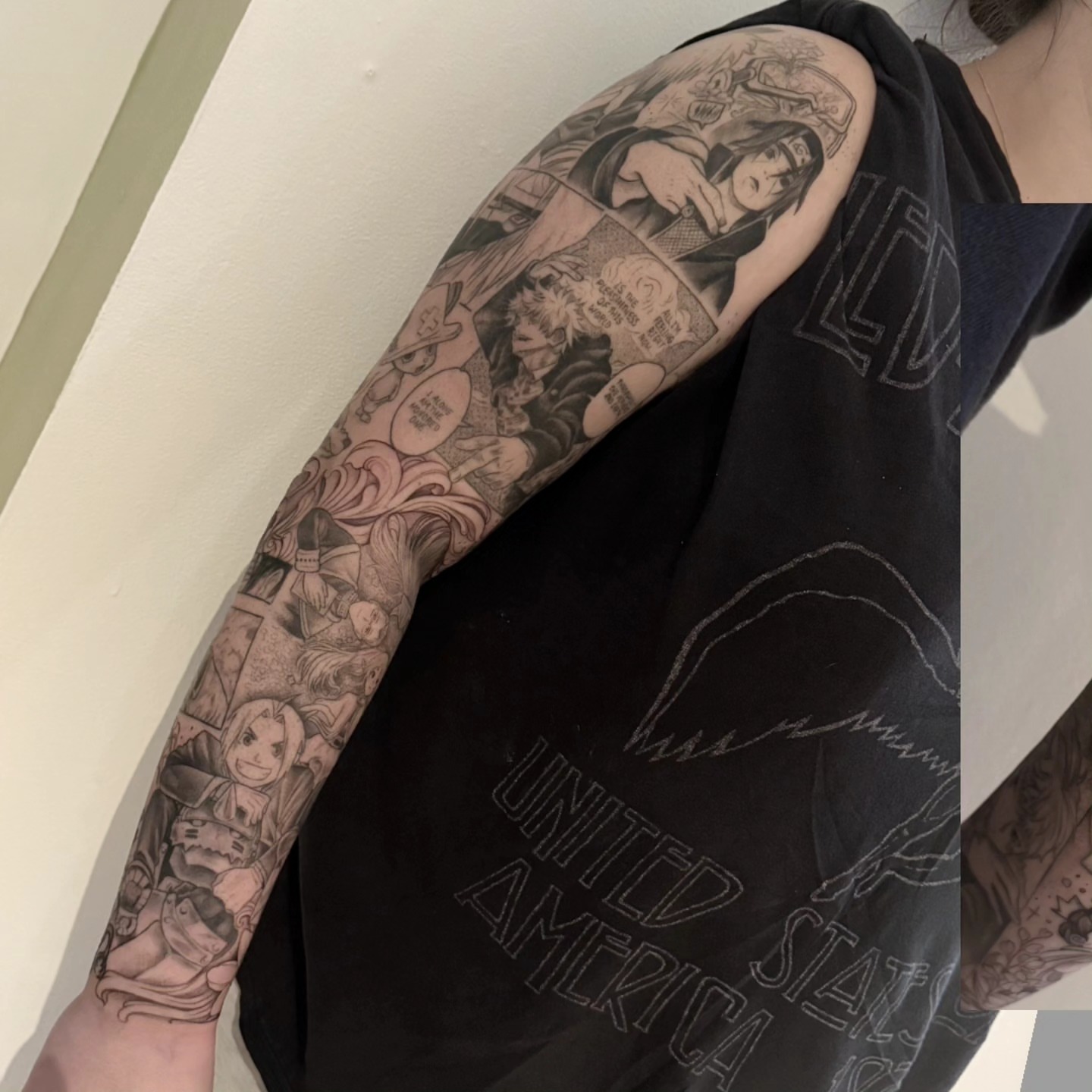 Anime characters anime tattoo on the forearm by Lynx, Cincinnati, Ohio