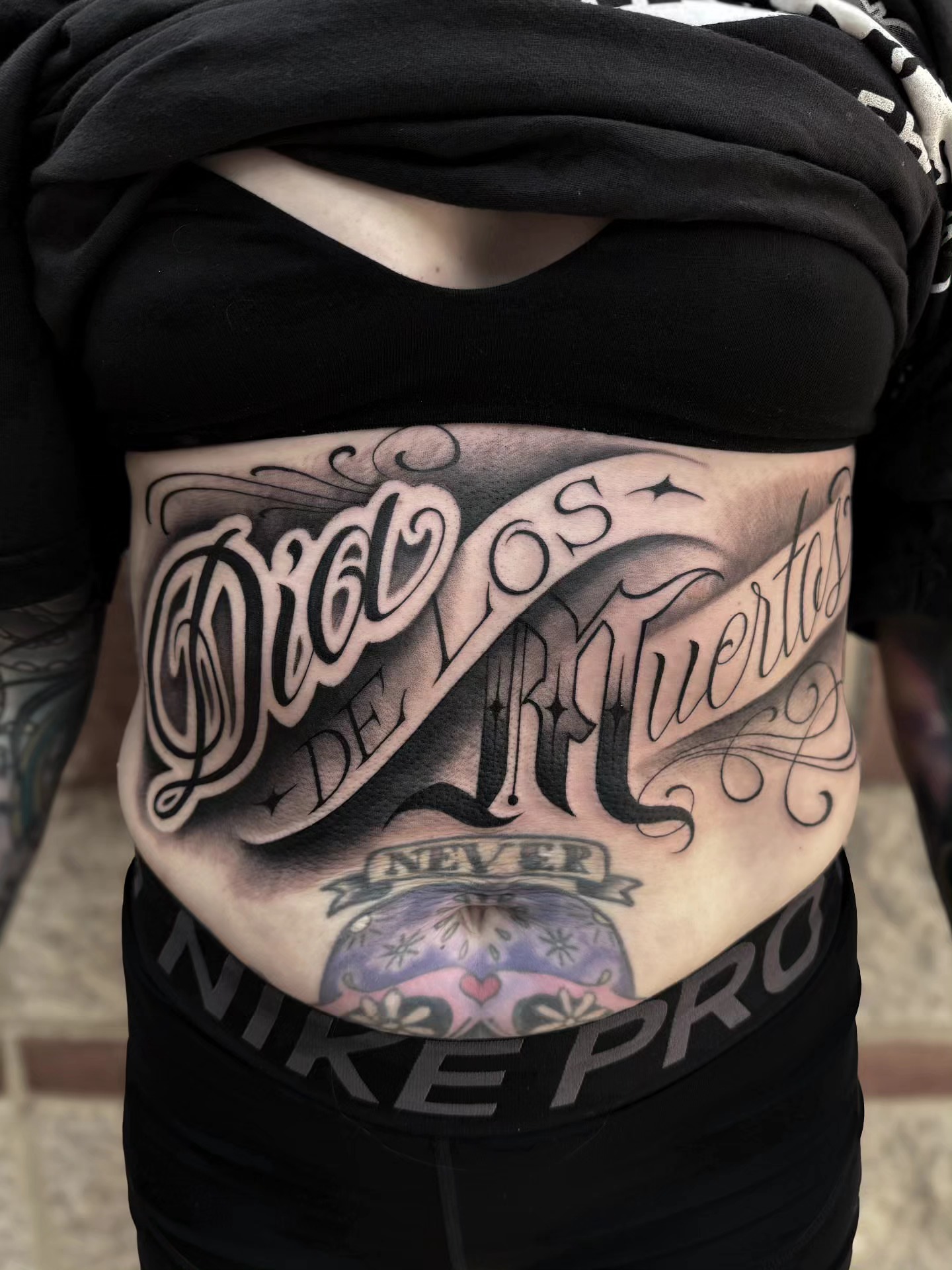 Script lettering lettering script tattoo on the torso by Kelsi Steffensen