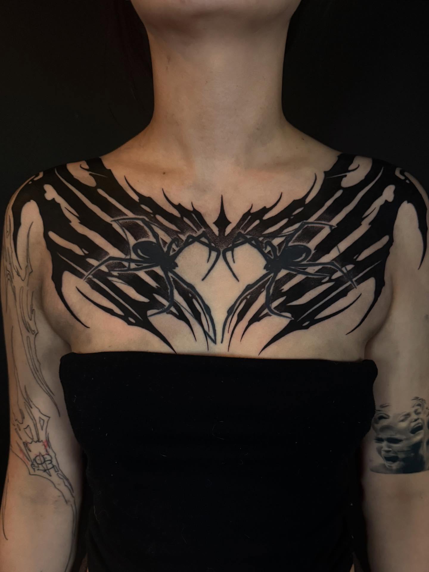 Spider tribal tattoo on the chest by Dylan Orbock, Berkeley, California