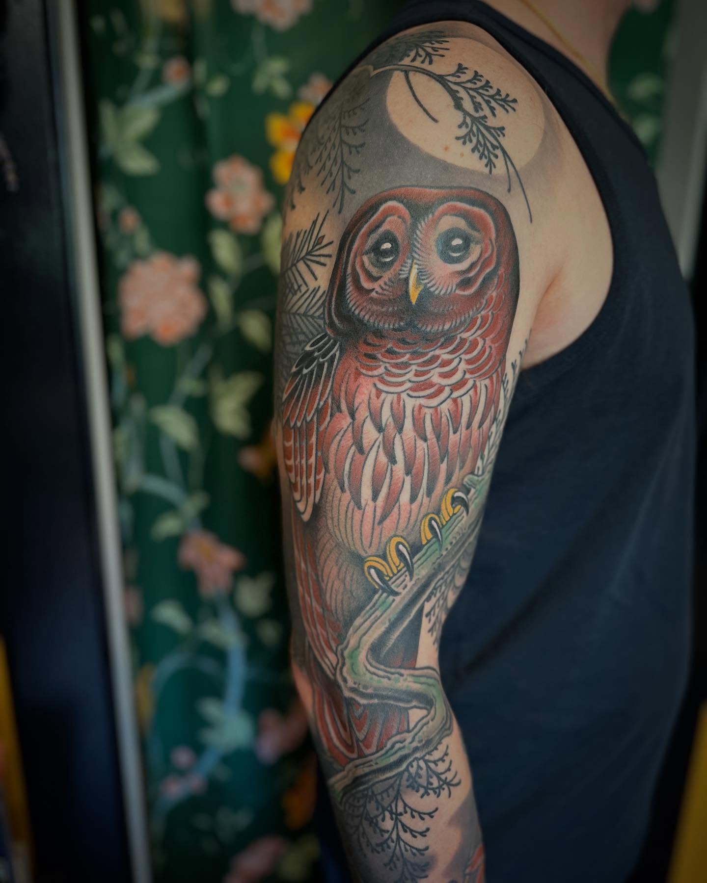 Owl realism tattoo on the upper arm by Megon Shore, Seattle, Washington