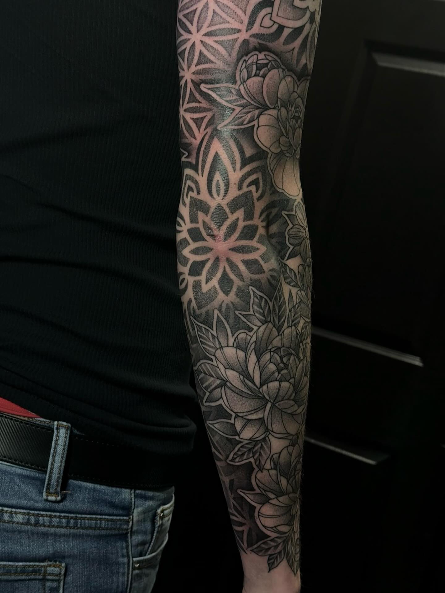 Floral mandala geometric tattoo on the forearm by Jesse (Dreadzilla)